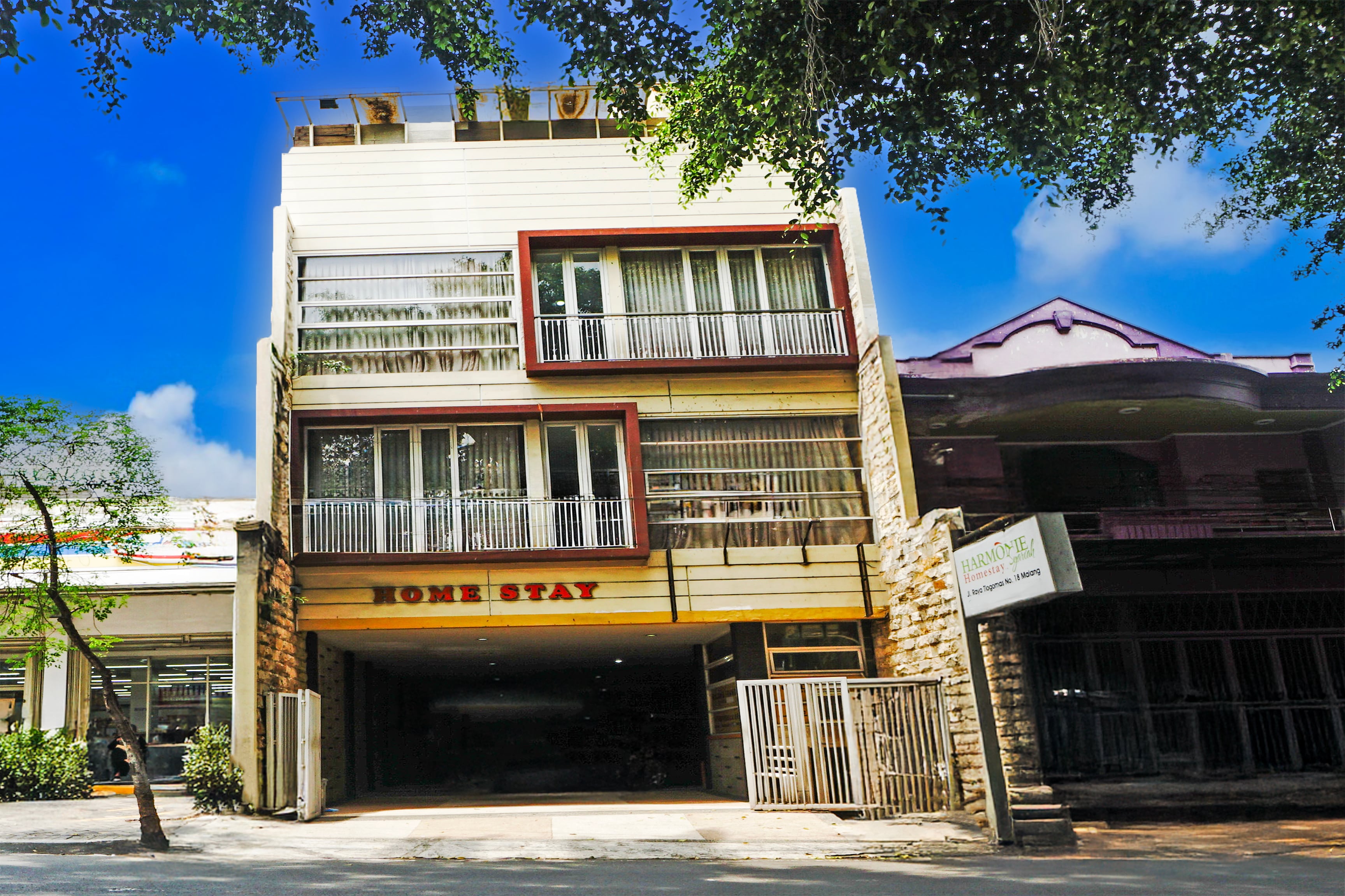 Hotel O Symphony Homestay Tlogomas - Tap to explore photos