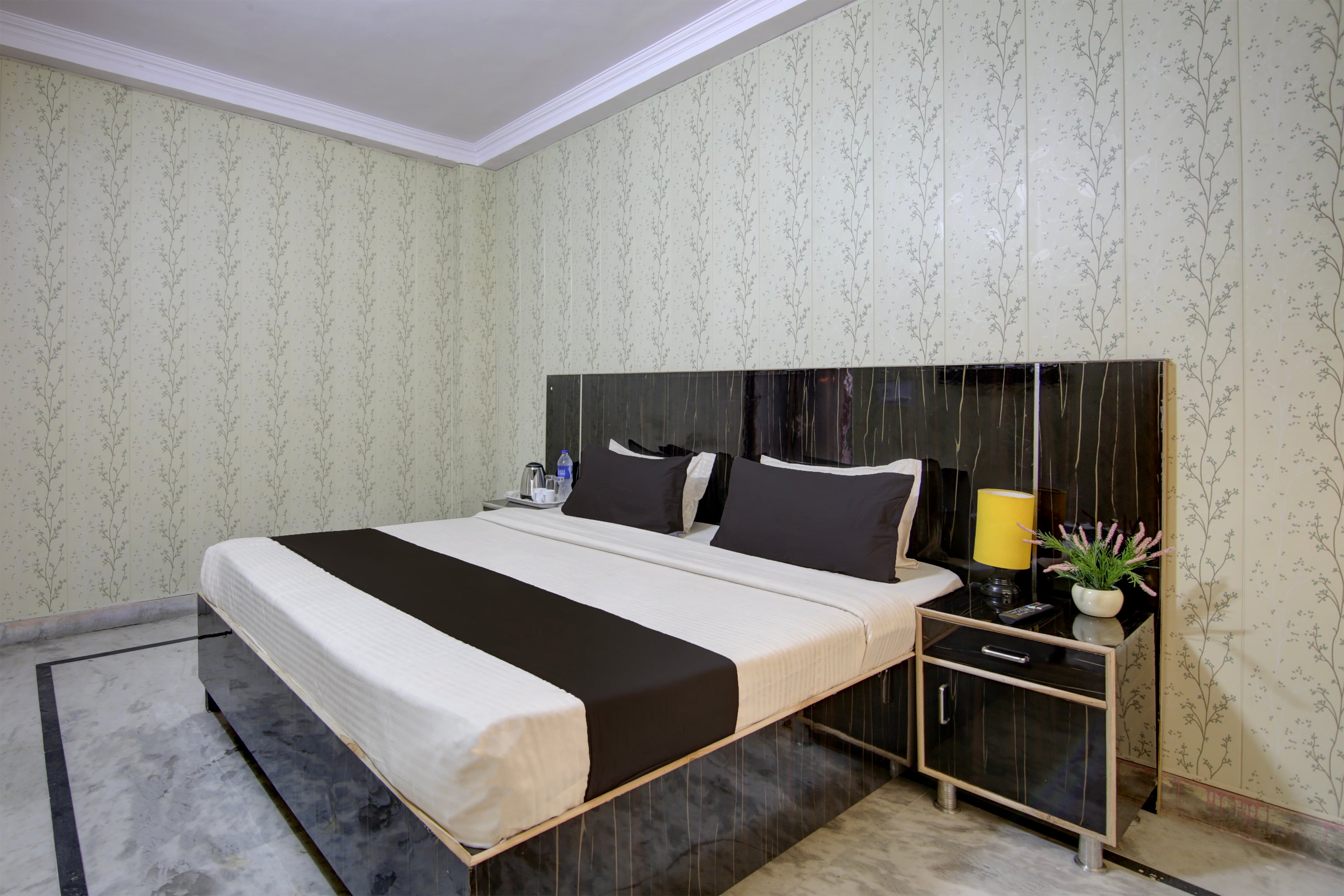 Hotel O AJSY Rooms - Tap to explore photos