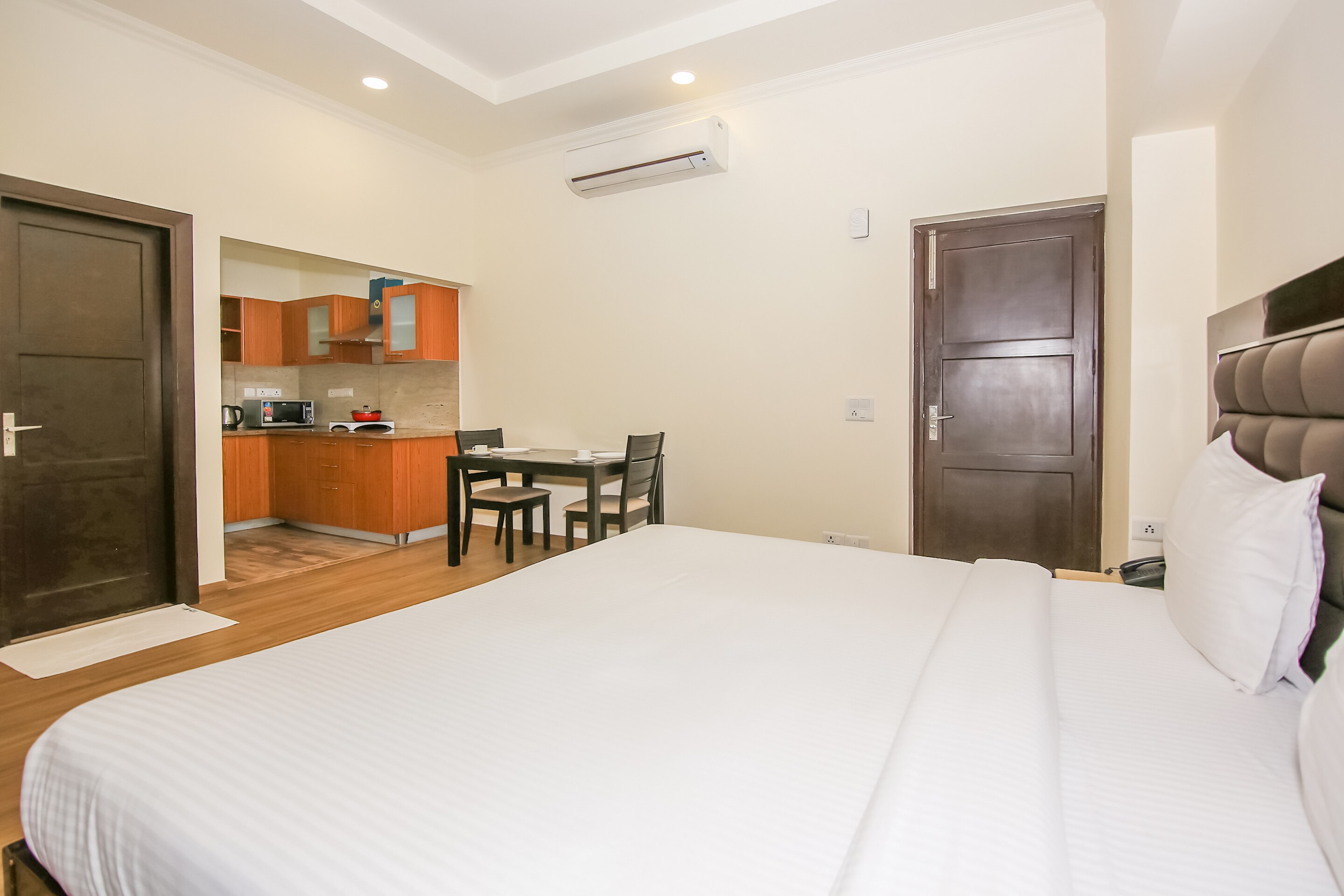 When In Gurgaon - Standard Plus Apartments | Next to Artemis - Tap to explore photos