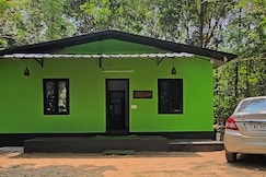 Cottage with lake view wild elephant roams freely, Munnar