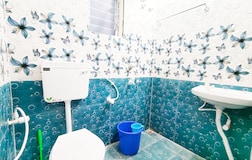 Golden Stay 2 (Non AC) with a private Kitchen and a King size bed.(Kitchen charges Rs200/night)