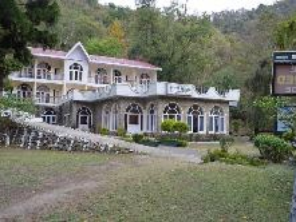 Vijay Orchads Cottages - Tap to explore photos