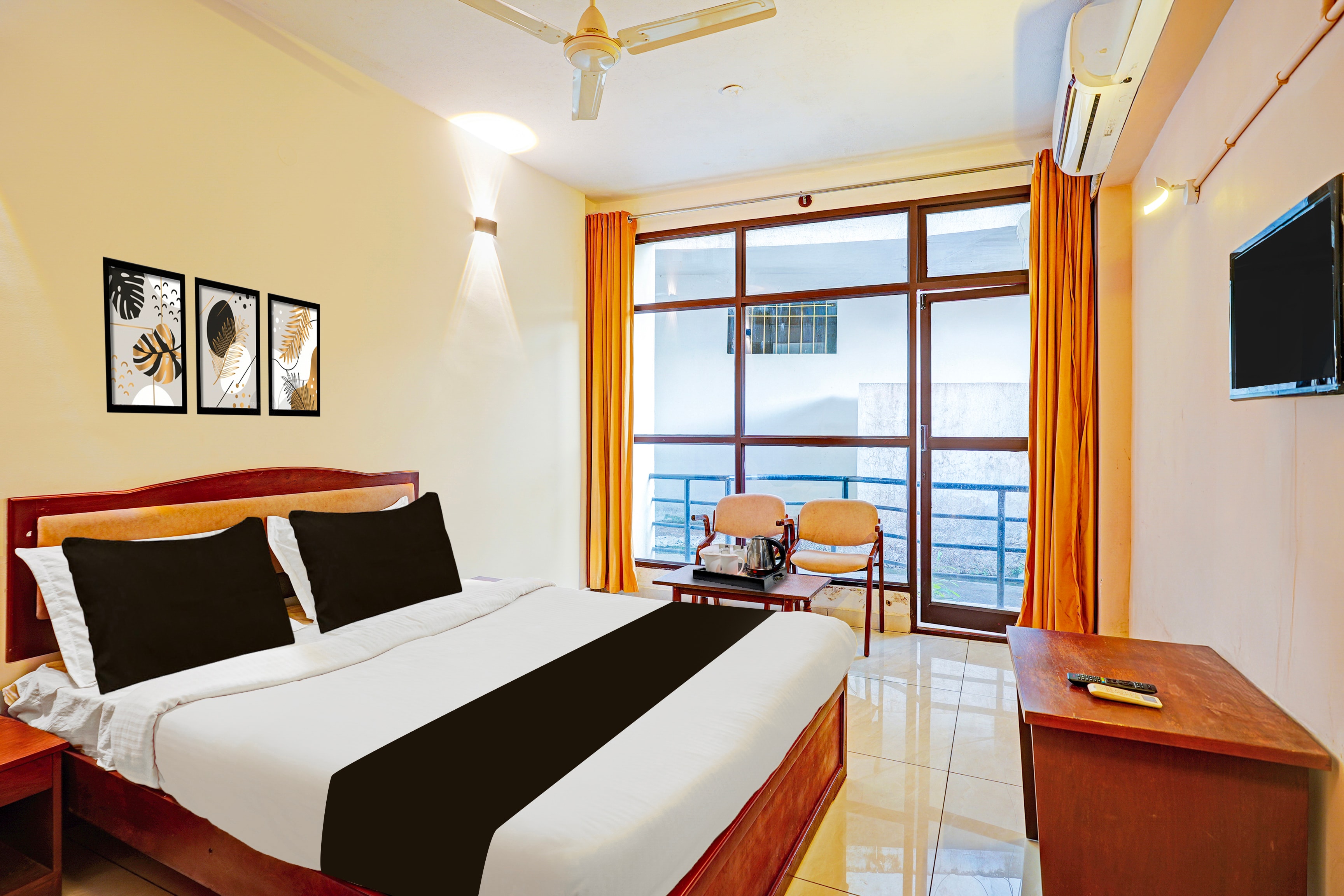 Super Townhouse Madikeri Fort Formerly Hotel Raj - Tap to explore photos