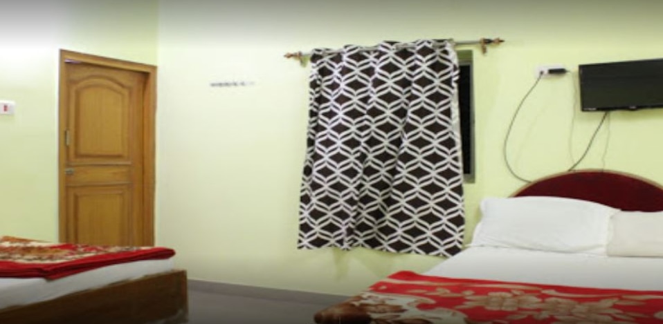 Urmila Guest House - Tap to explore photos