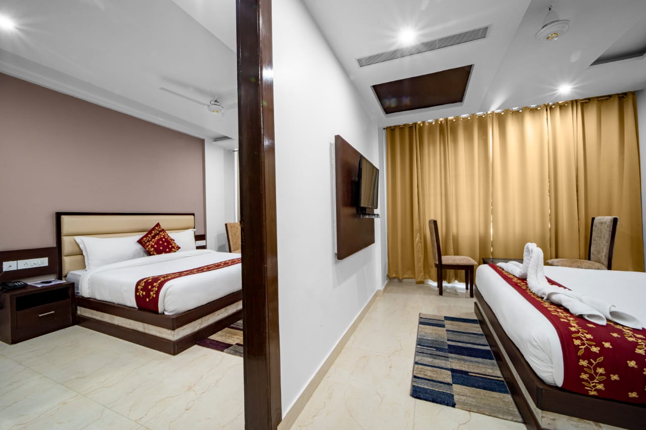 Hotel Trimurti - Tap to explore photos