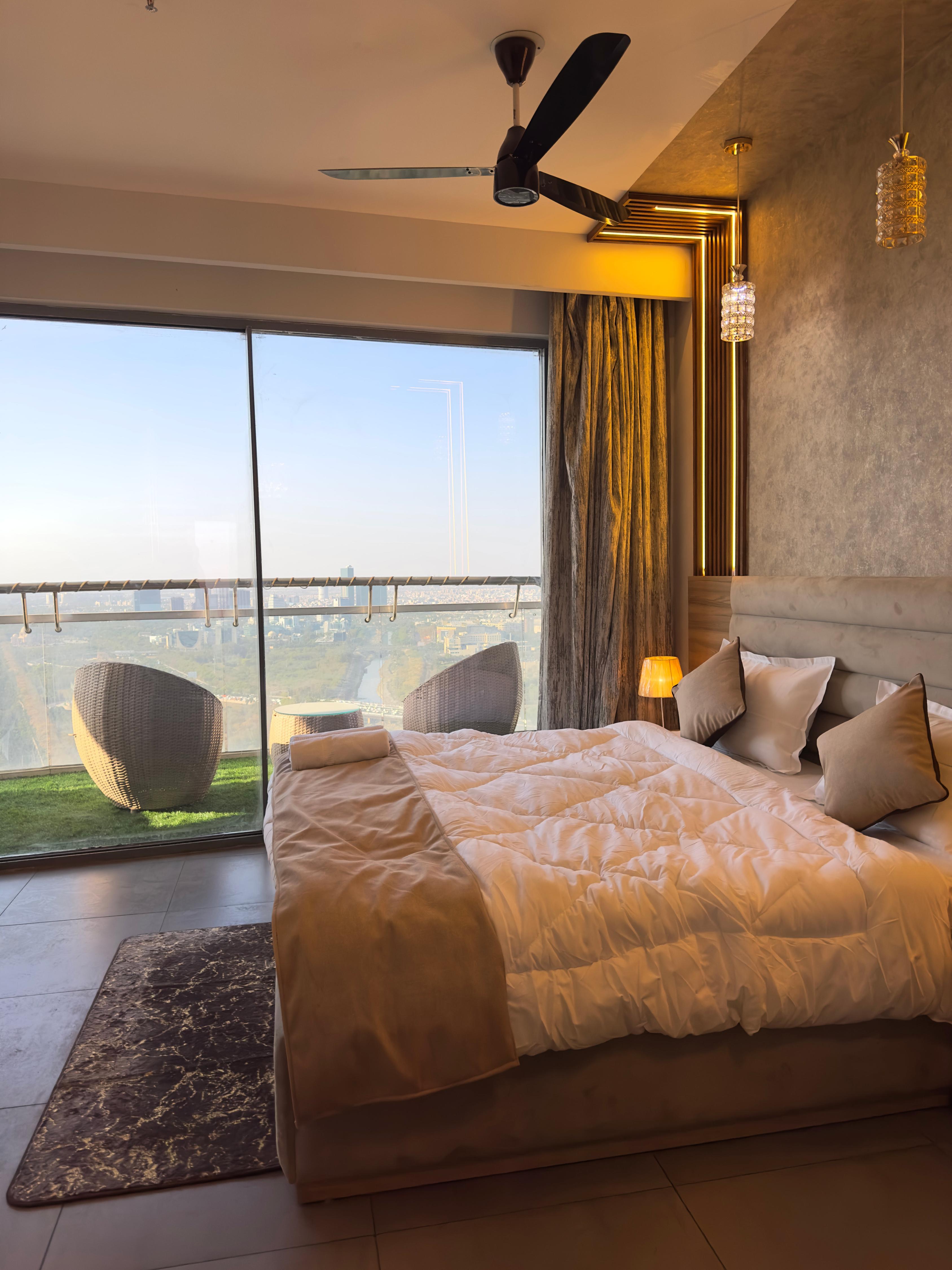 Elysian Suites  Your Cozy Escape   35th floor - Tap to explore photos