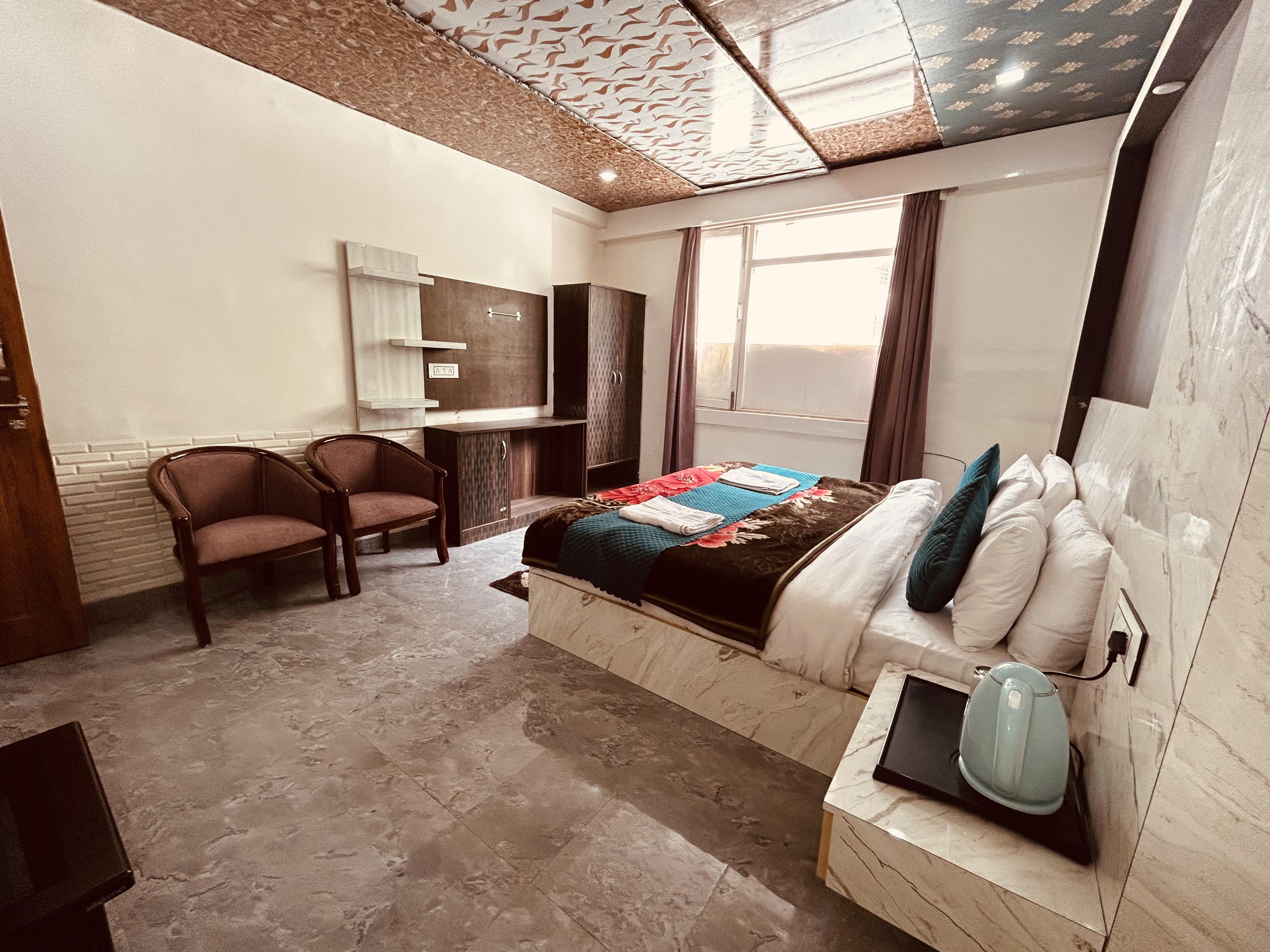 HOTEL NEW URVASHI - Tap to explore photos