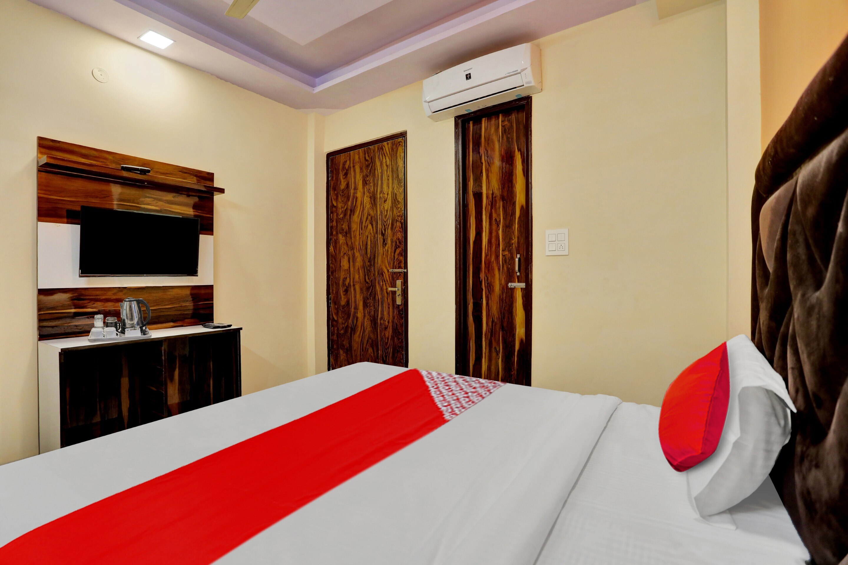 Hotel O S P Rooms - Tap to explore photos