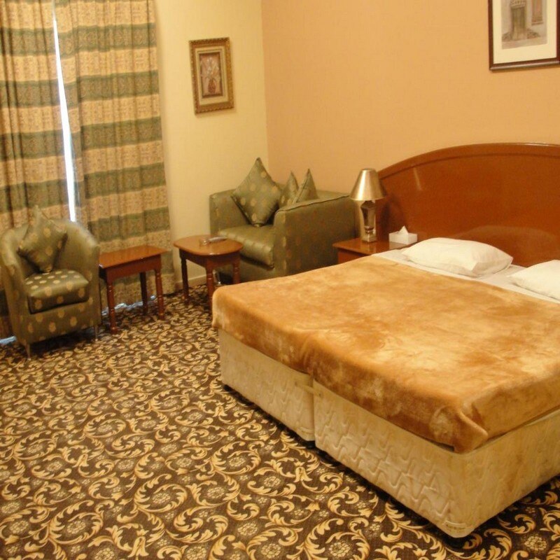 Summer Land Hotel Apartment - Tap to explore photos