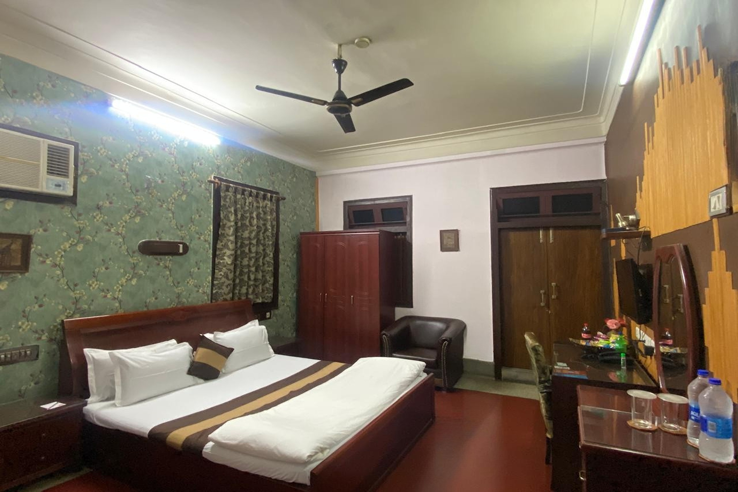 The Kei Suites - Tap to explore photos