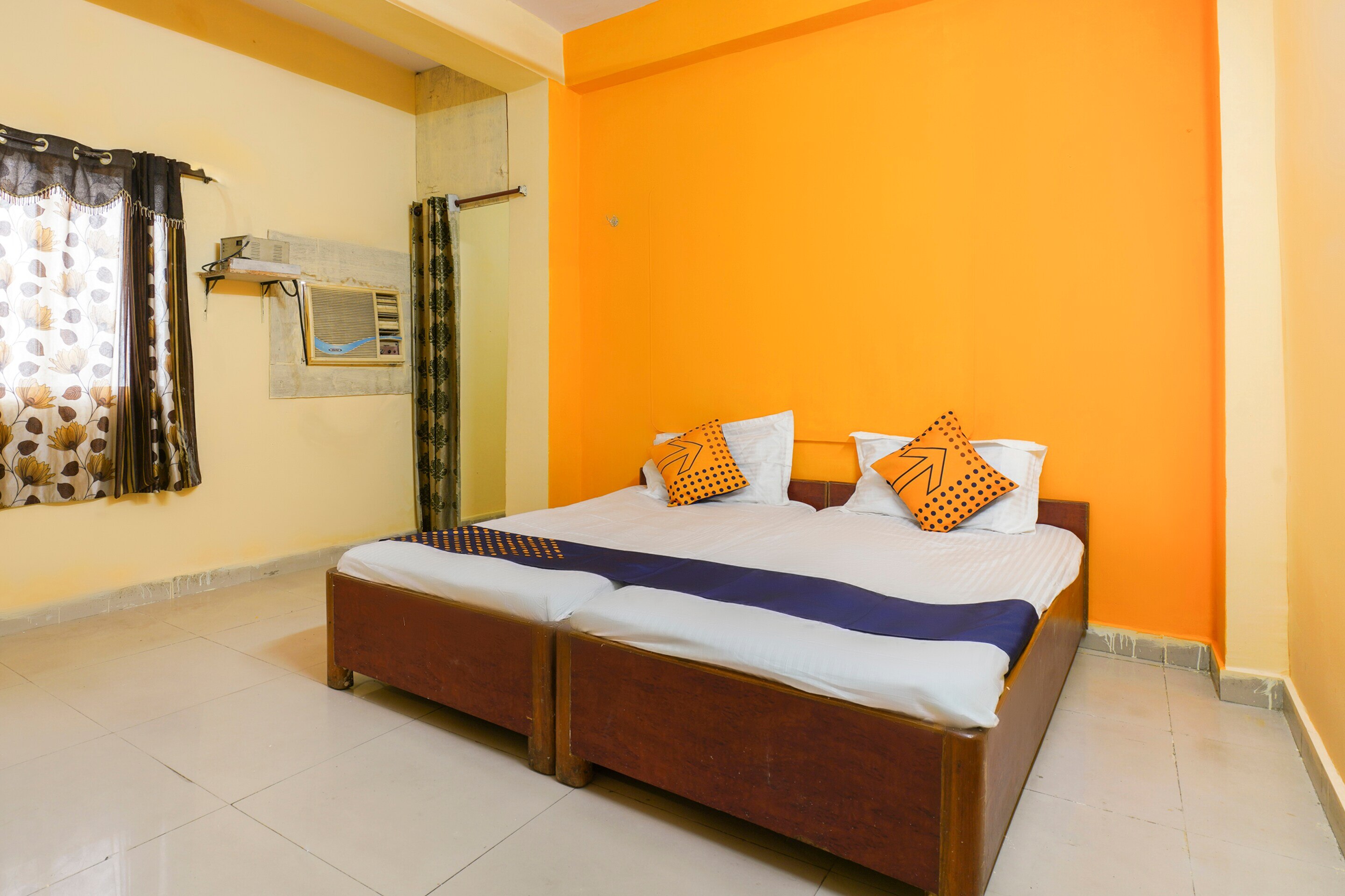 Hotel O Sai Vinayaka - Tap to explore photos
