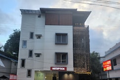 Redbell Suites - 50 Meter from Kottakkal Aryavaidyasala, Tirurangadi