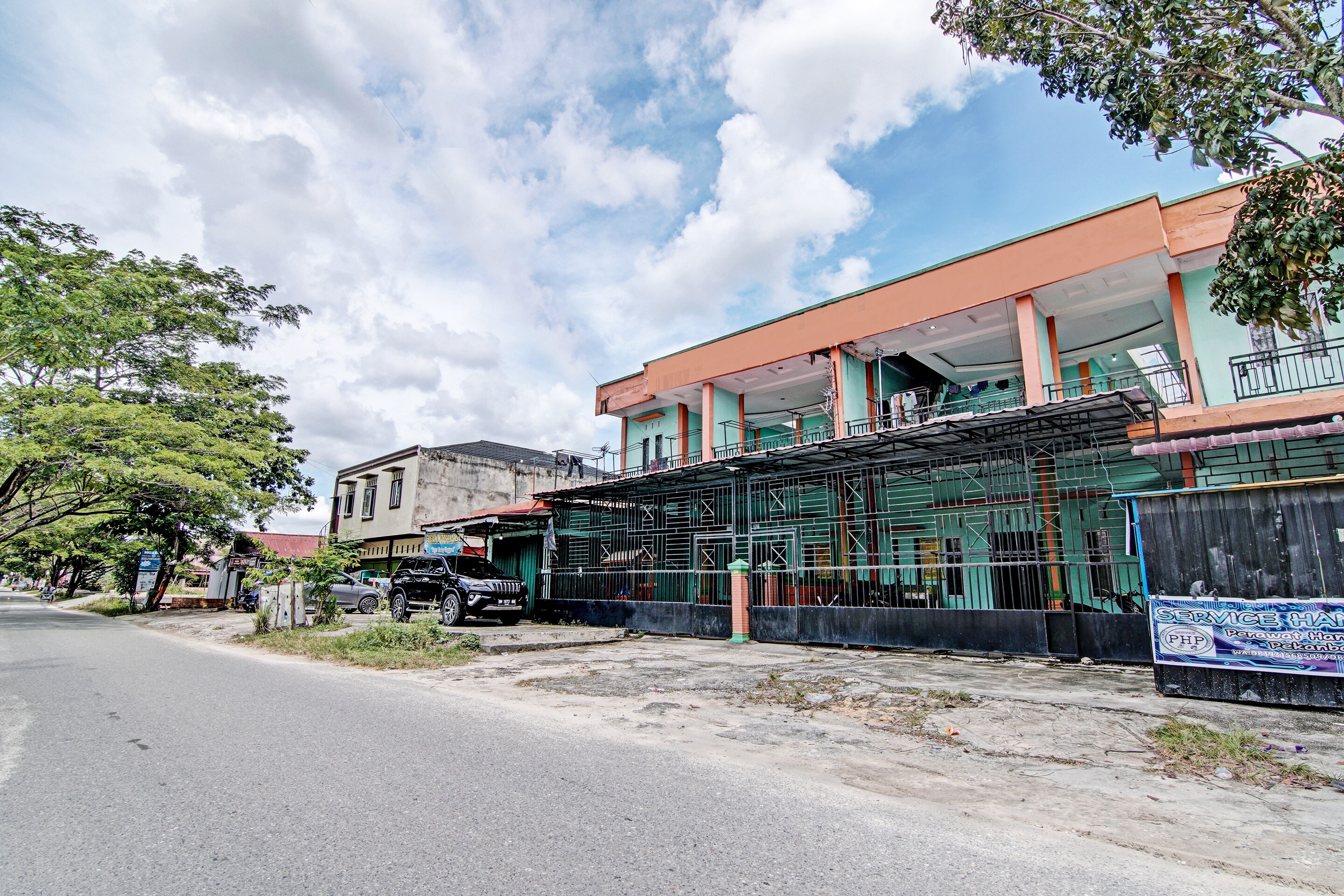 Hotel O Penginapan Syafira Near Perumahan Mustamindo Permai 1 - Tap to explore photos