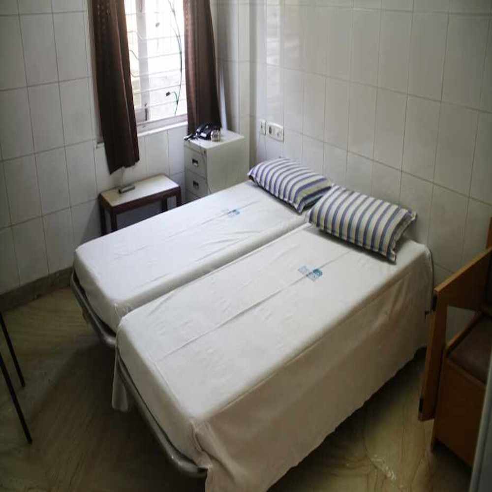 Paradise Guest House  Near Marina Beach - Tap to explore photos