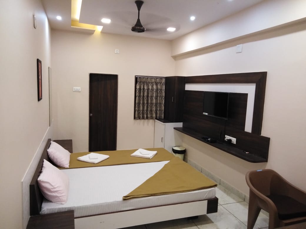 Hotel Tulsi Residency - Tap to explore photos