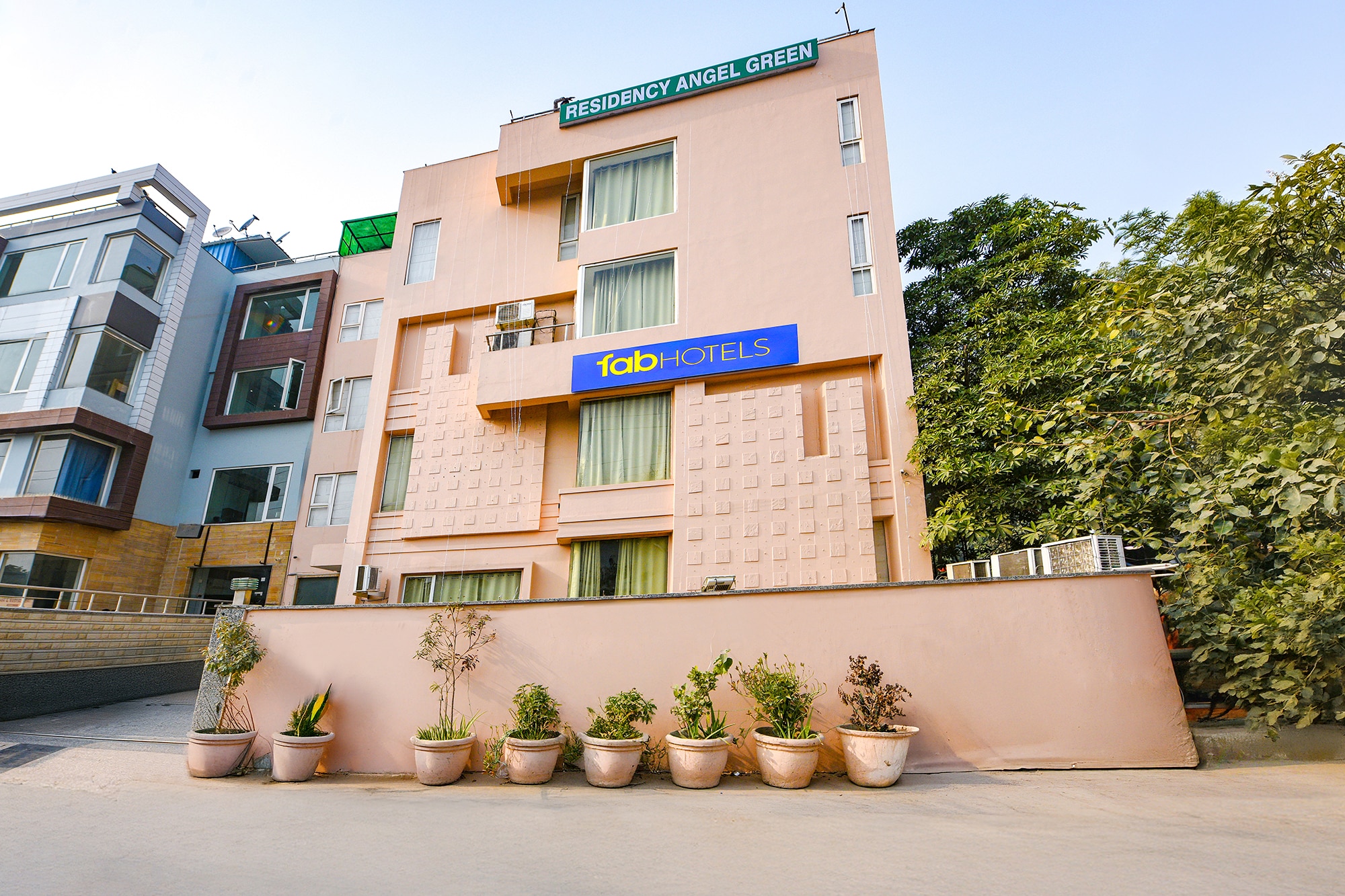 FabHotel Angel Green Residency - UNITECH CYBER PARK - Tap to explore photos