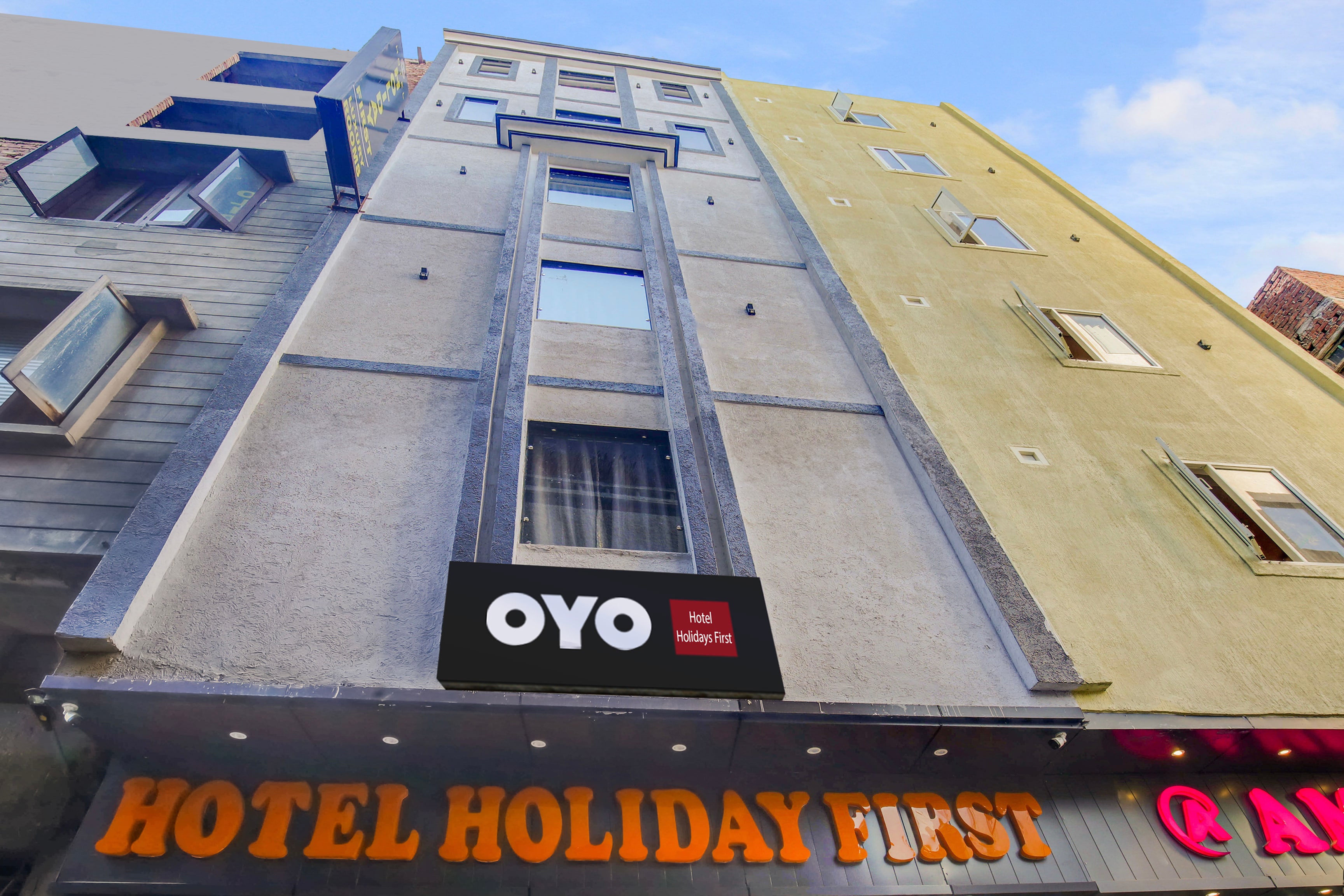 Hotel O Holiday First - Tap to explore photos