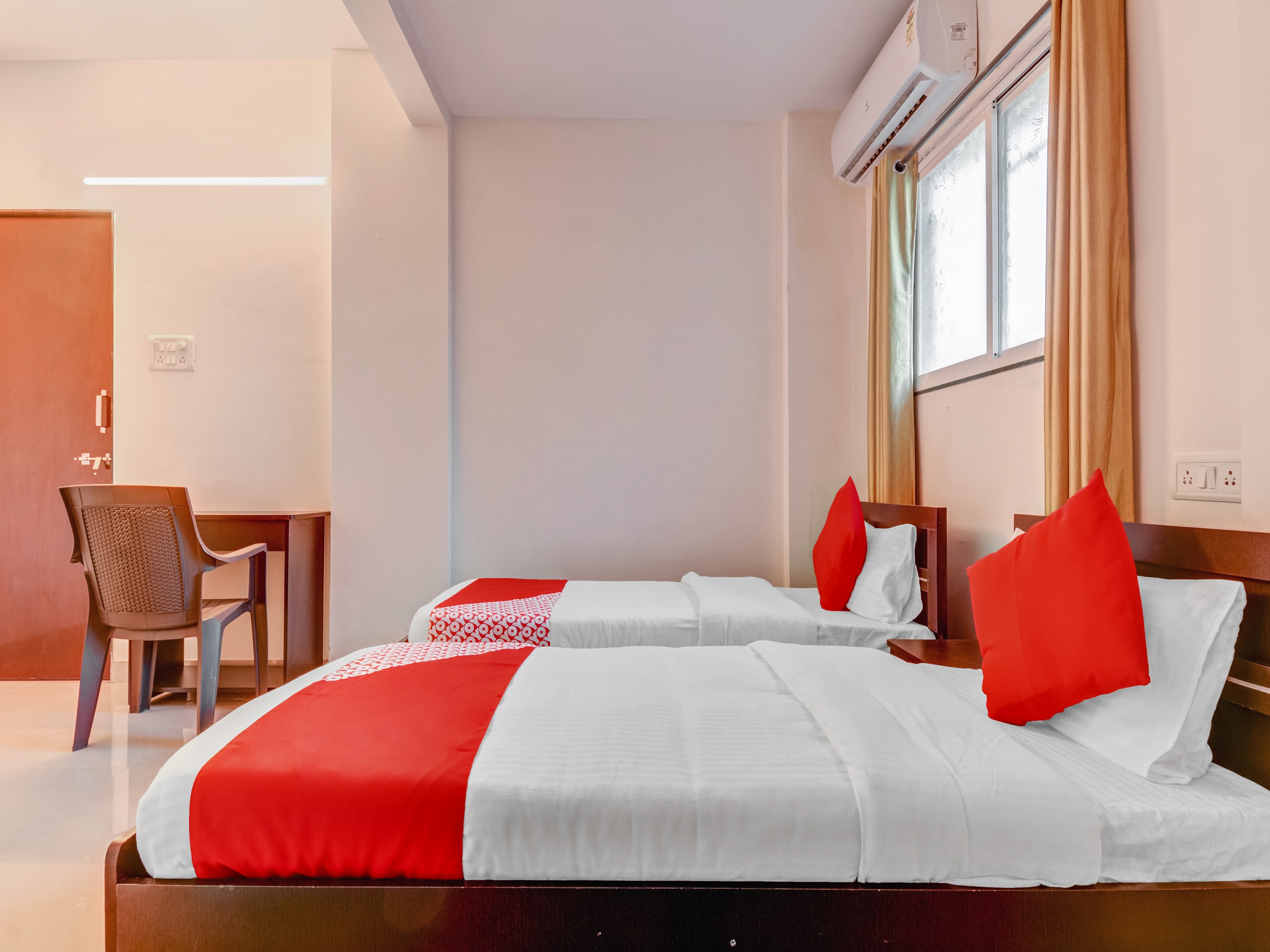 Hotel O EKAB Hospitality - Tap to explore photos