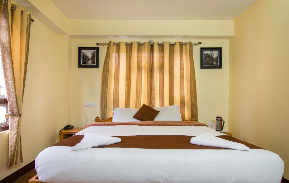 Jain Group Lachung Continental - Tap to explore photos