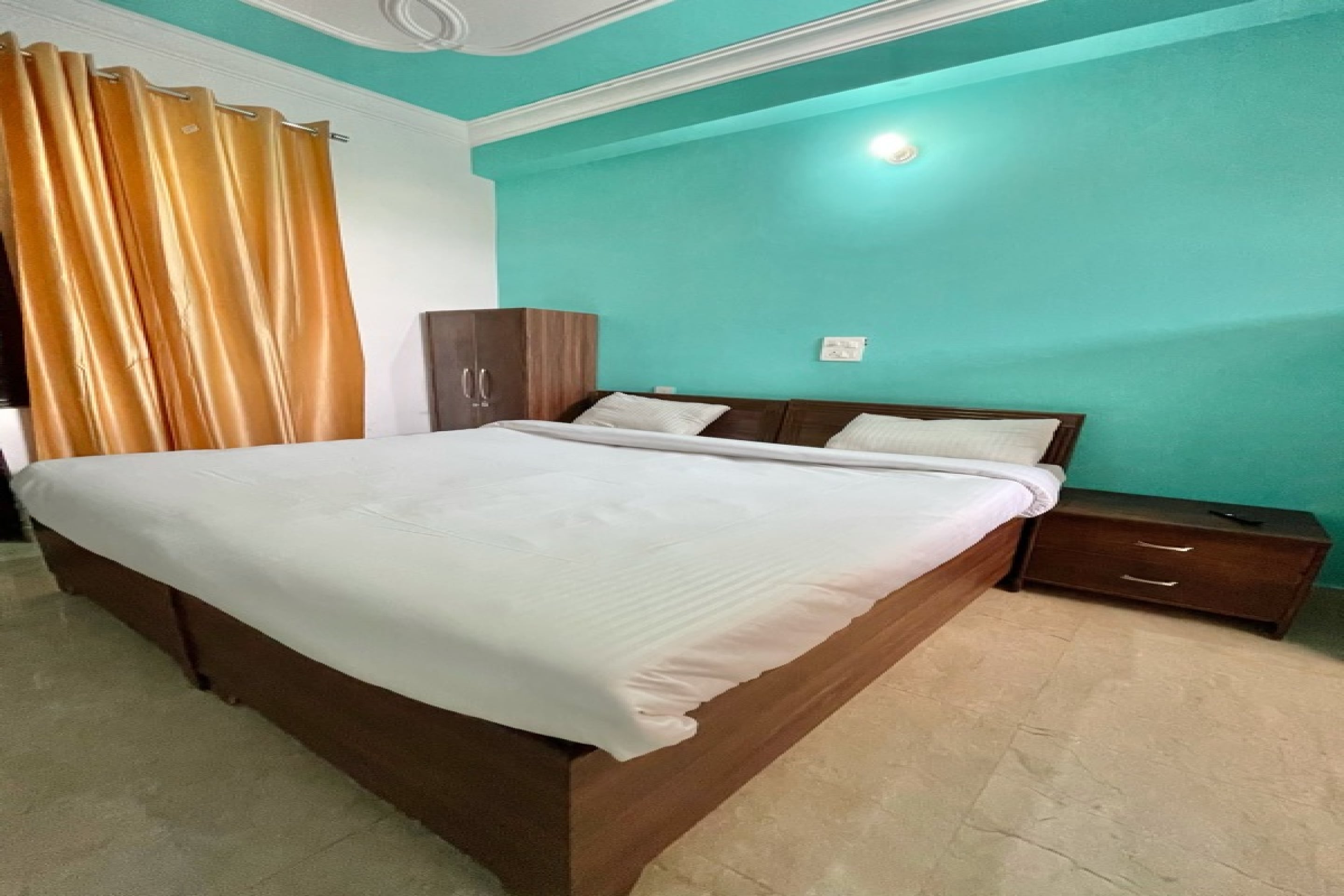 Capital O Kanha Guest House - Tap to explore photos