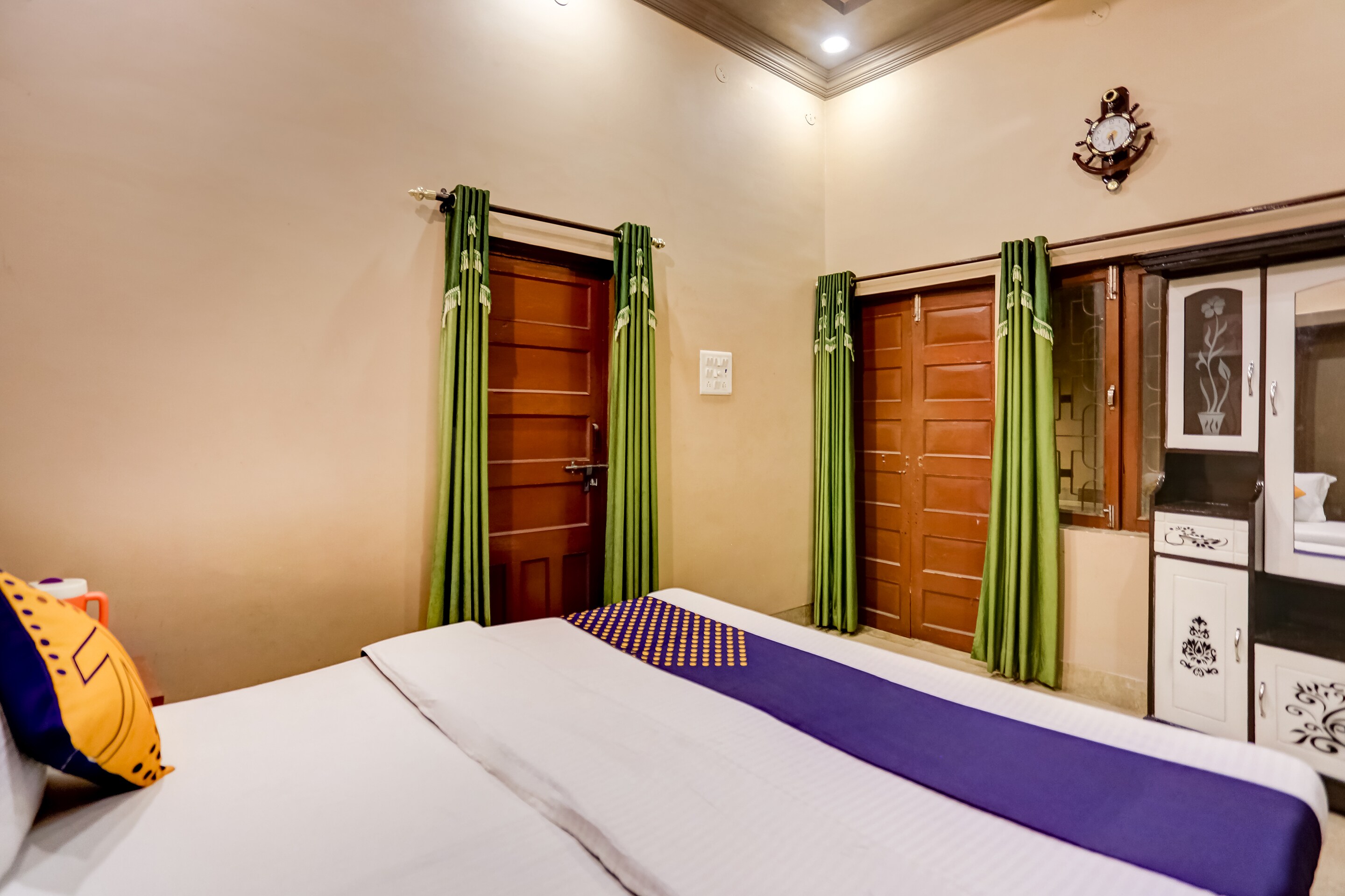 SPOT ON Hotel Sarojani Villa - Tap to explore photos