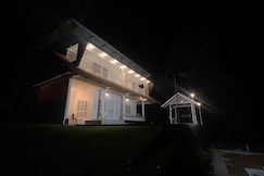 Peaceful resort stay filled with calm nature charm, Munnar