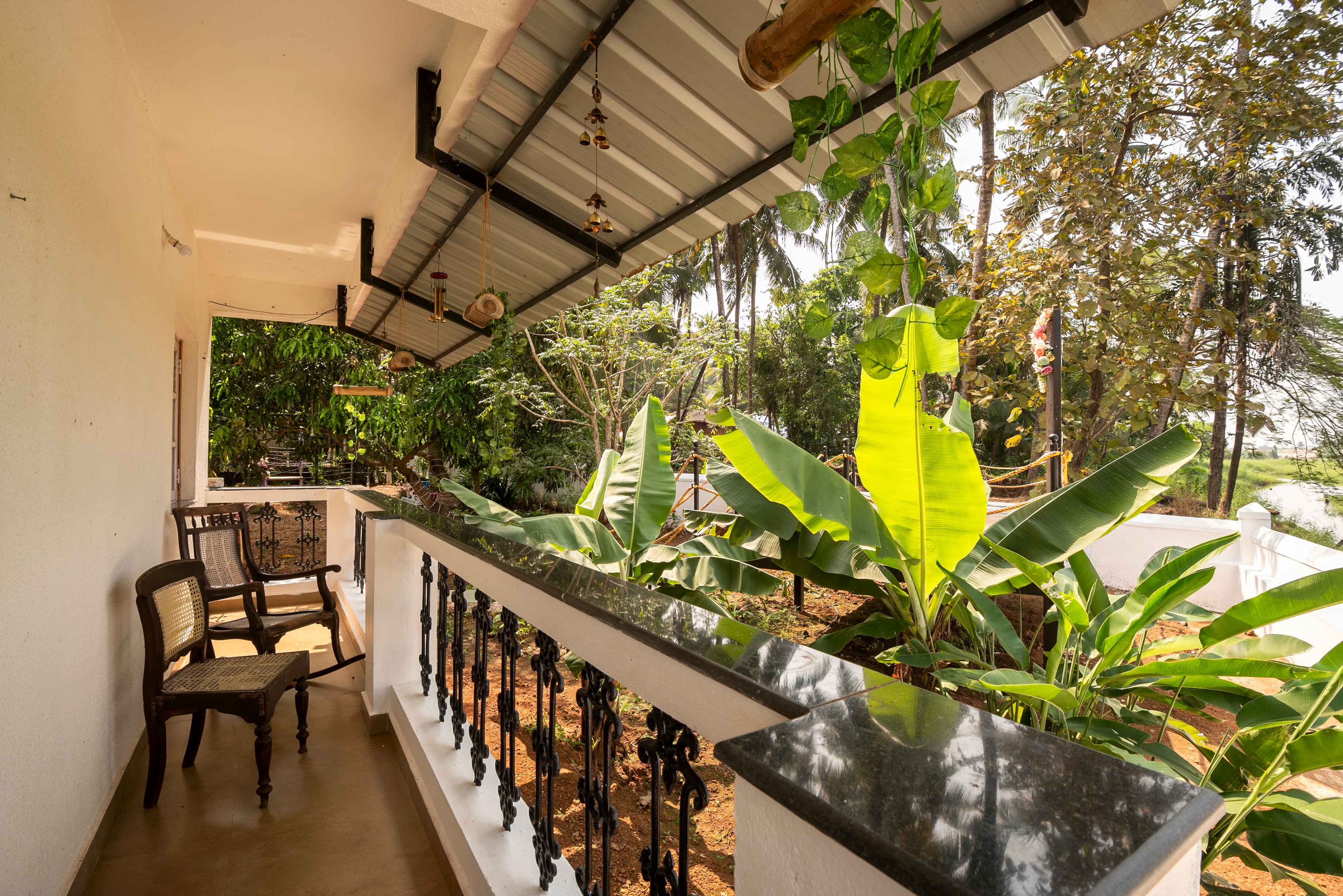 Riverfront Mystical Garden 2BHK by Aquagreen Homes - Tap to explore photos
