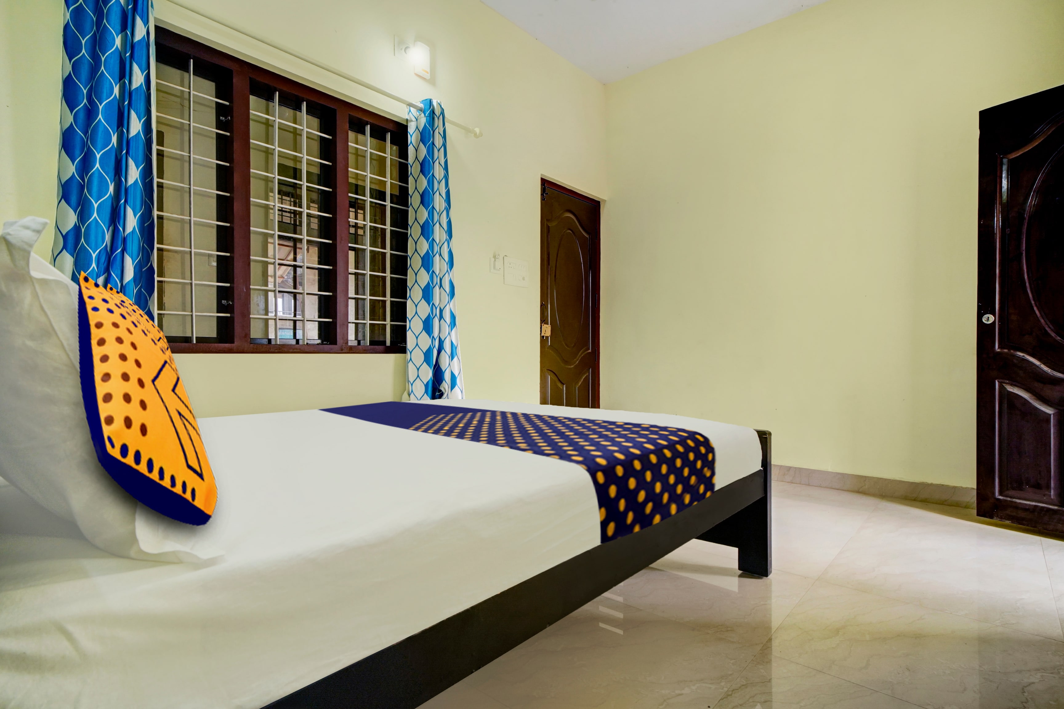 SPOT ON Riyan Suites - Tap to explore photos