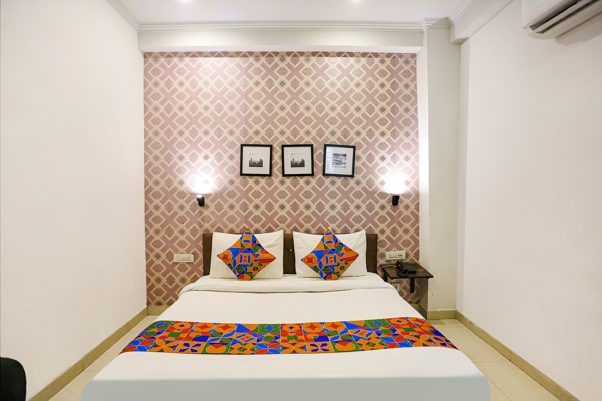FabExpress Novel Suites - Nr. Yashobhoomi Convention Centre - Tap to explore photos