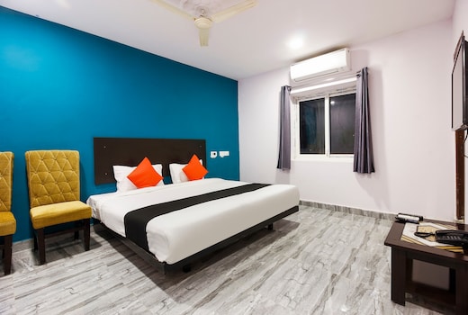 Capital O Che Sigma Hotel