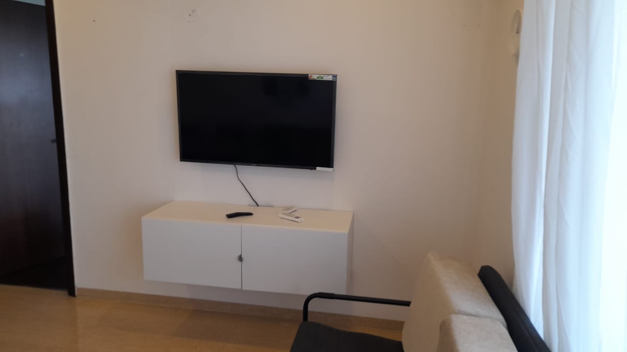 Ac furnished studio flat at higher floor in Lodha 19 - Tap to explore photos