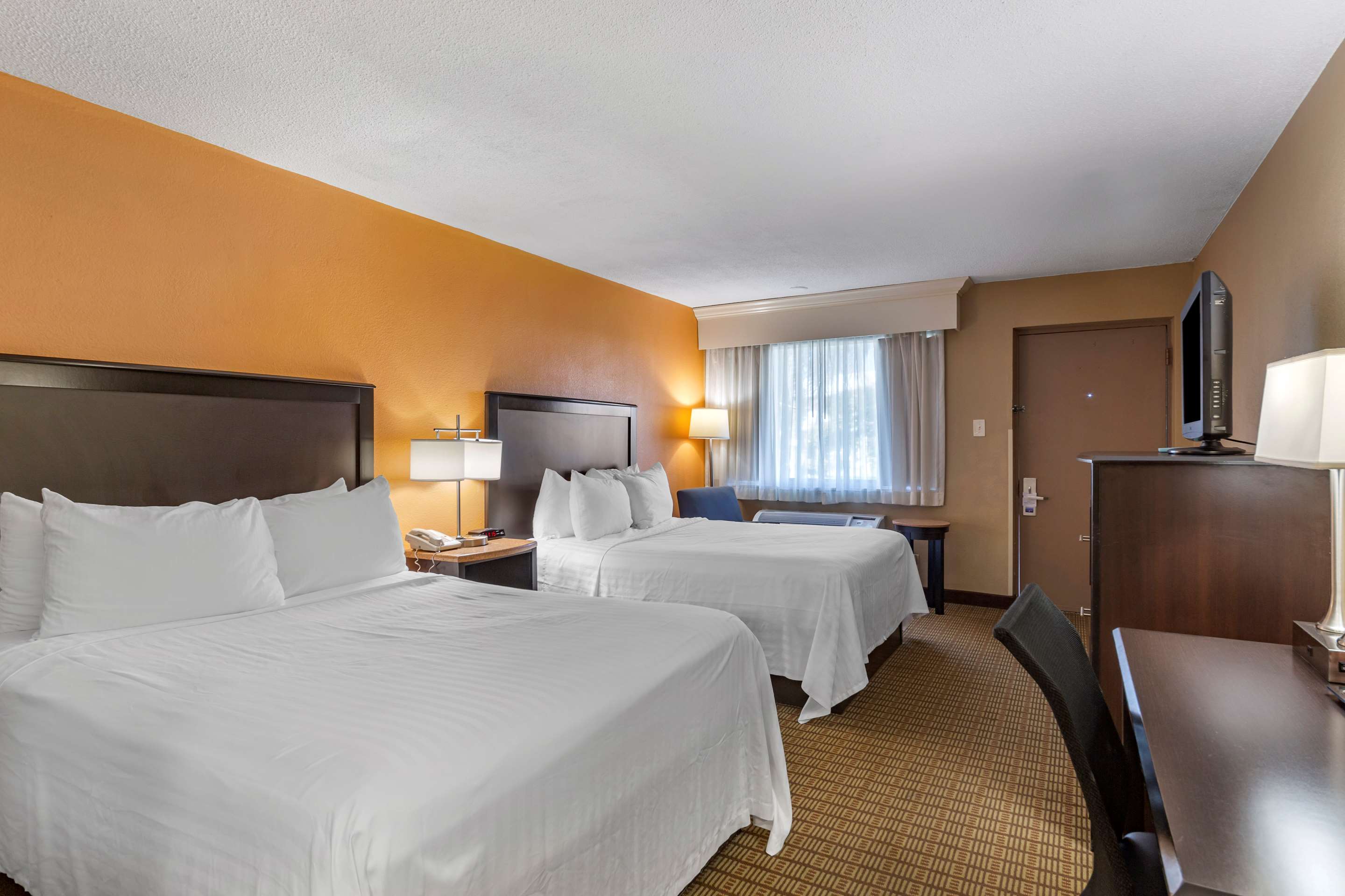 Best Western Palm Beach Lakes - Tap to explore photos