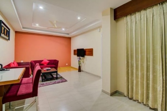Gardeenia Comfortes Suites - Tap to explore photos
