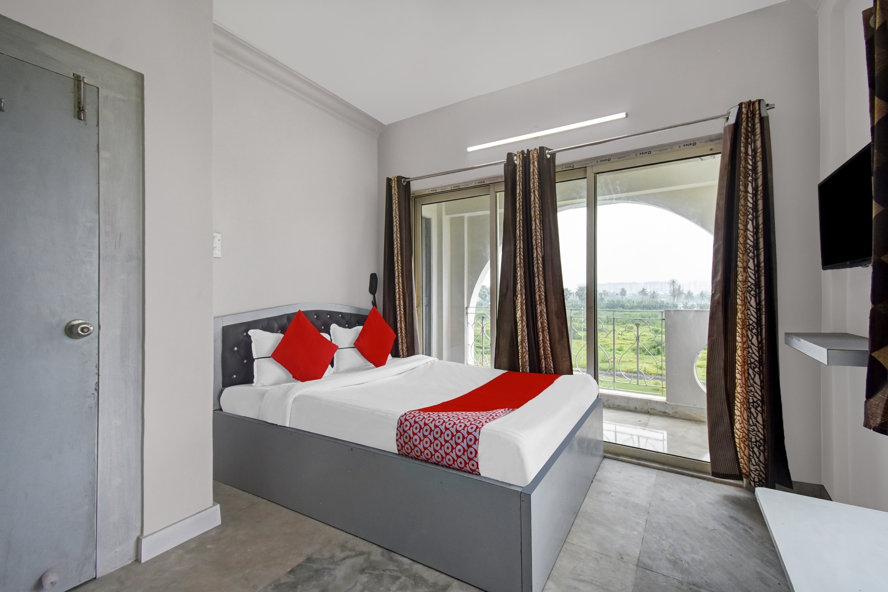 Super Hotel O J M T Upasana - Tap to explore photos