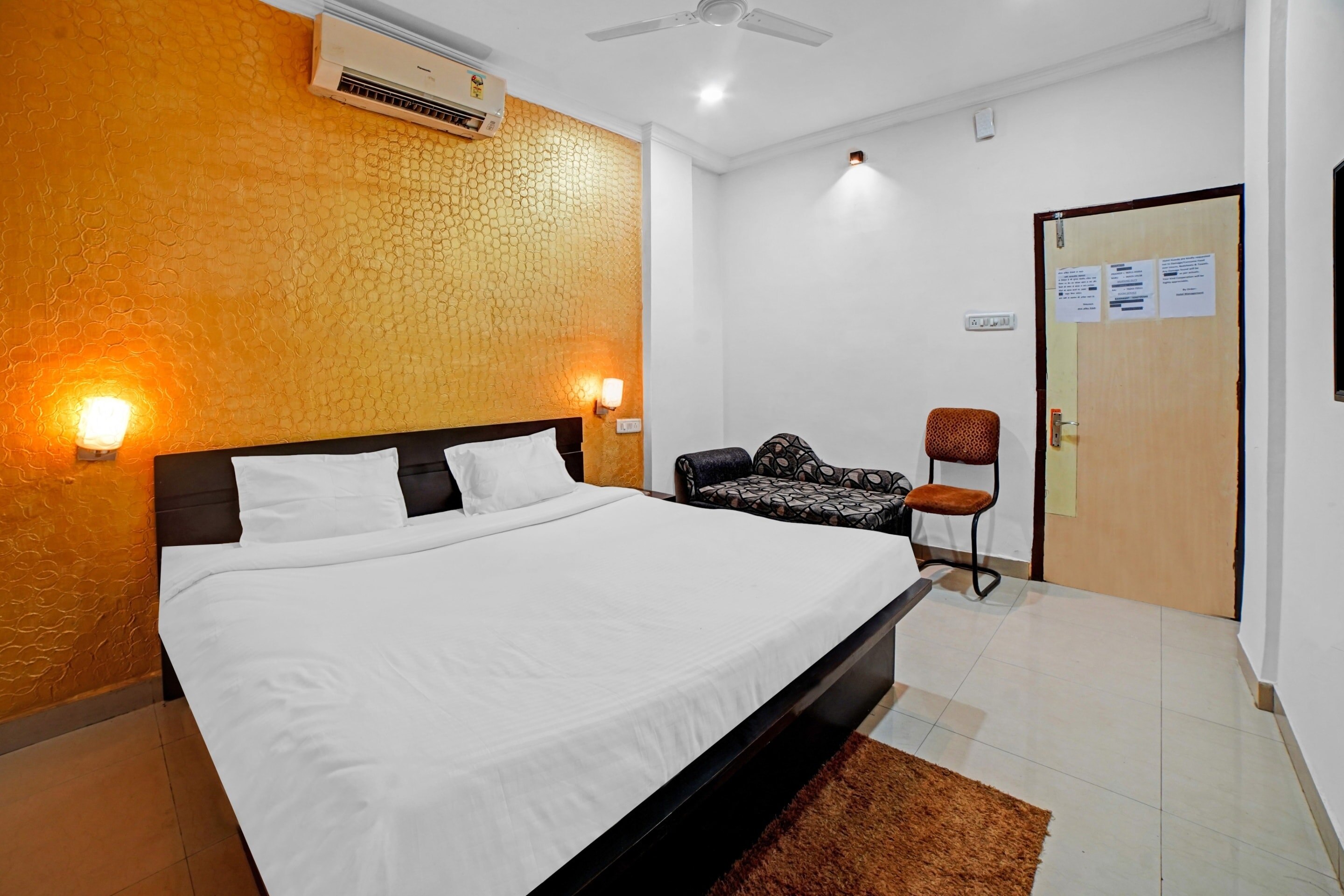 Capital O Convivial Hotel Amit Regency - Tap to explore photos