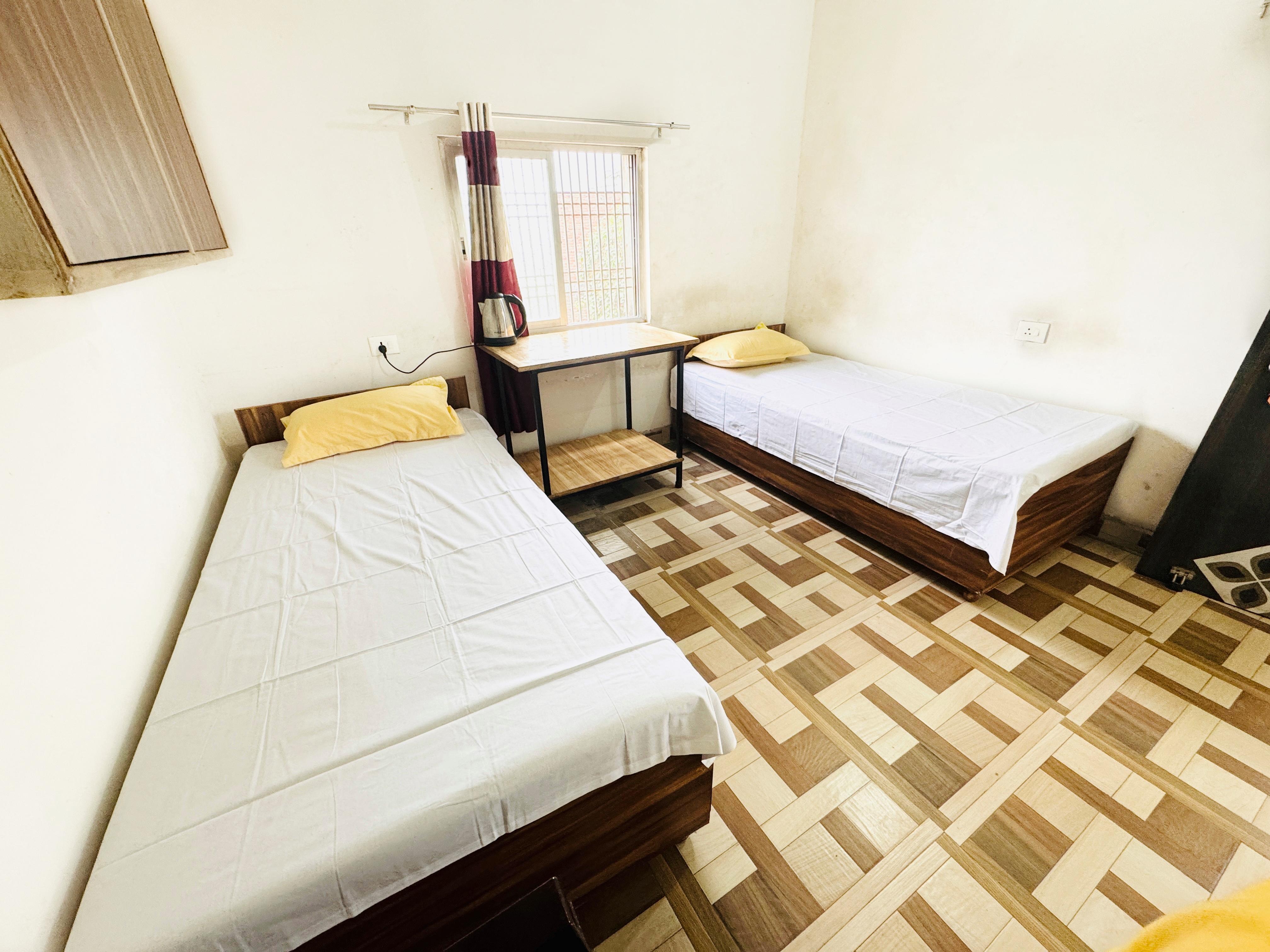 Yum Boys hostel & PG - Tap to explore photos