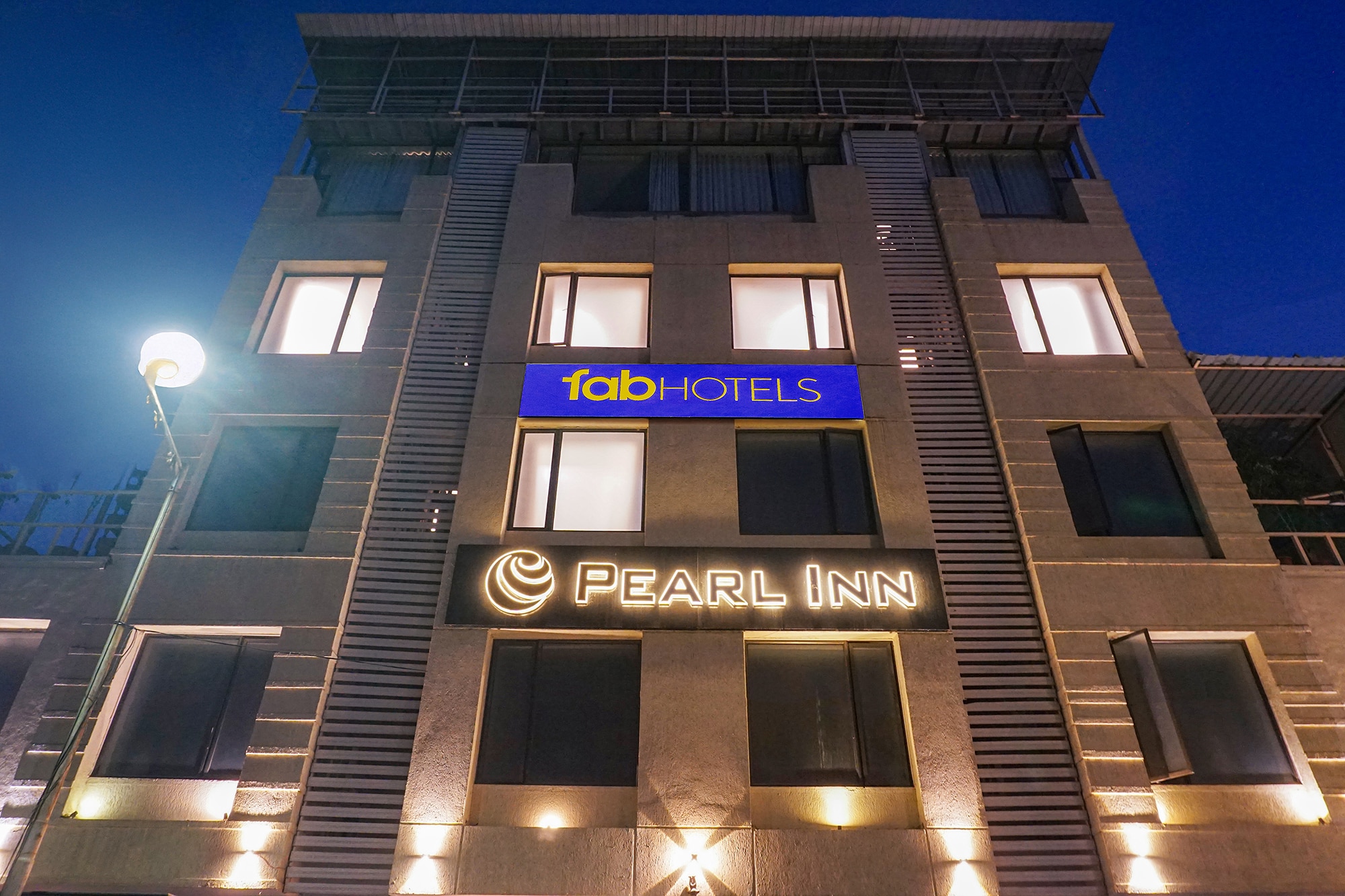 FabHotel Executive Pearl Inn - Nr. Twin tower - Tap to explore photos