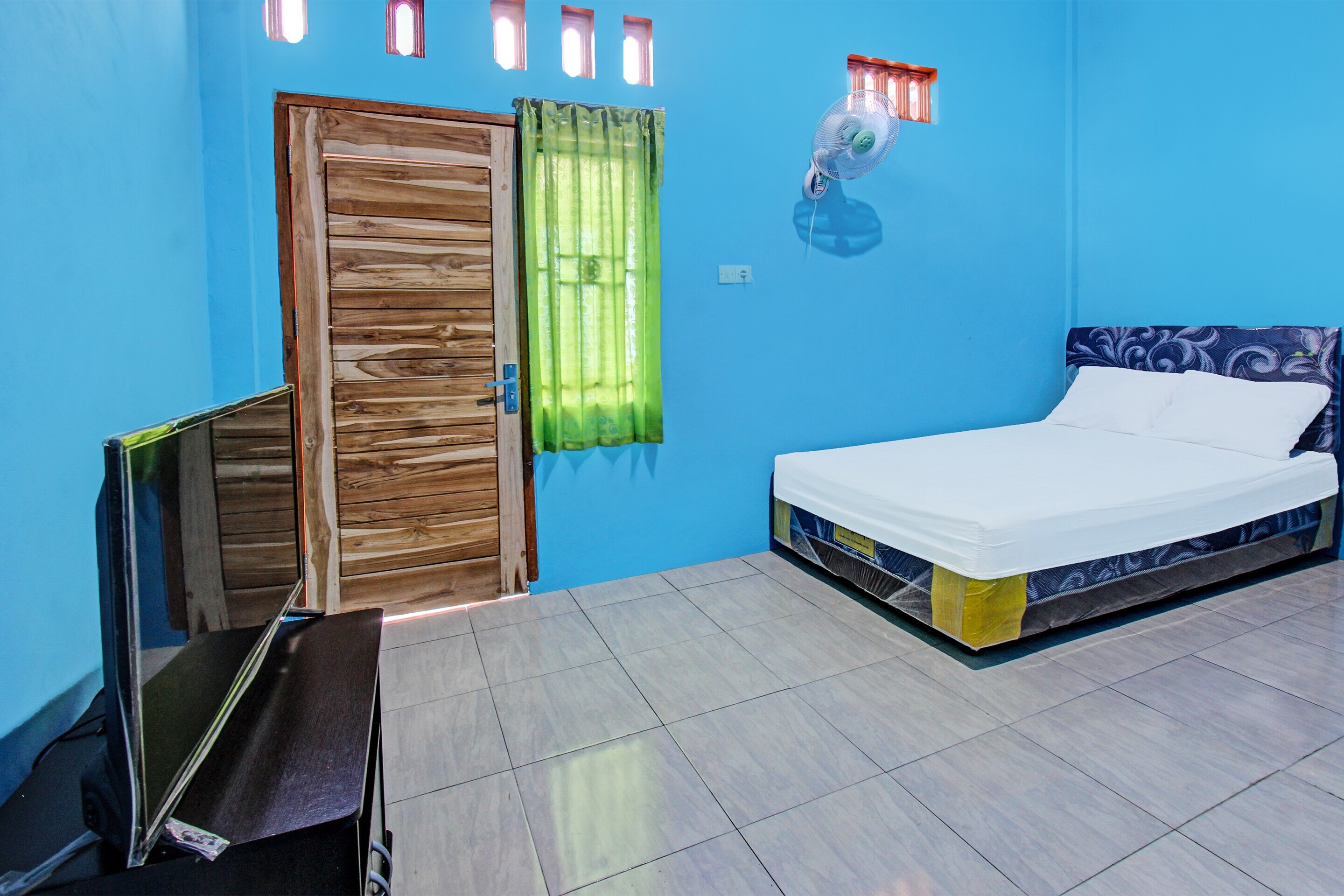 SPOT ON 91811 Rumah Inap Bunda Nurhayati - Tap to explore photos