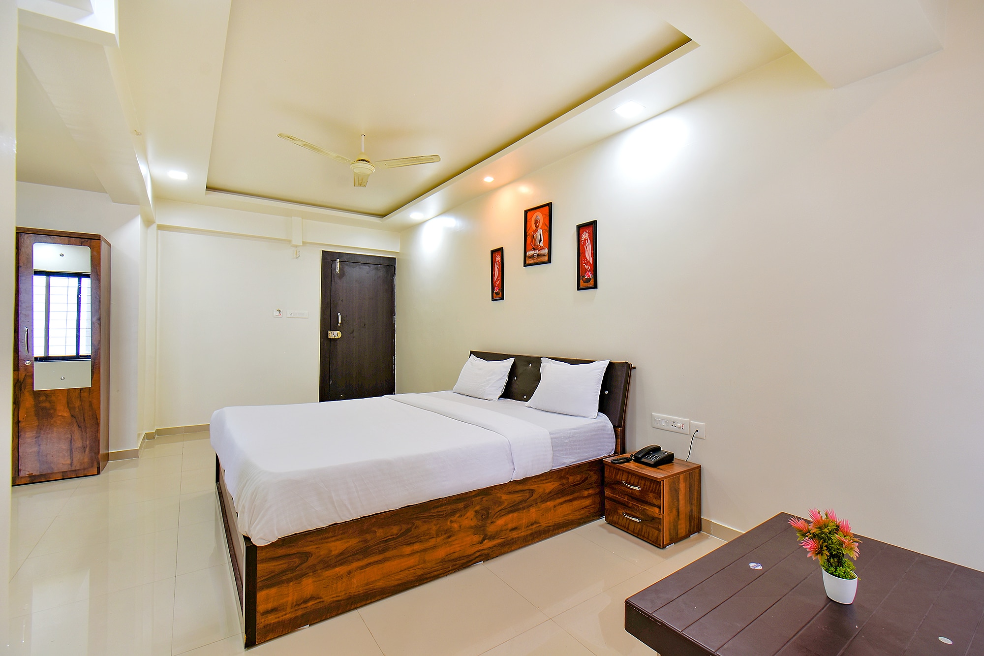 FabHotel White House - Nr. Sinhagad Speciality Hospital - Tap to explore photos
