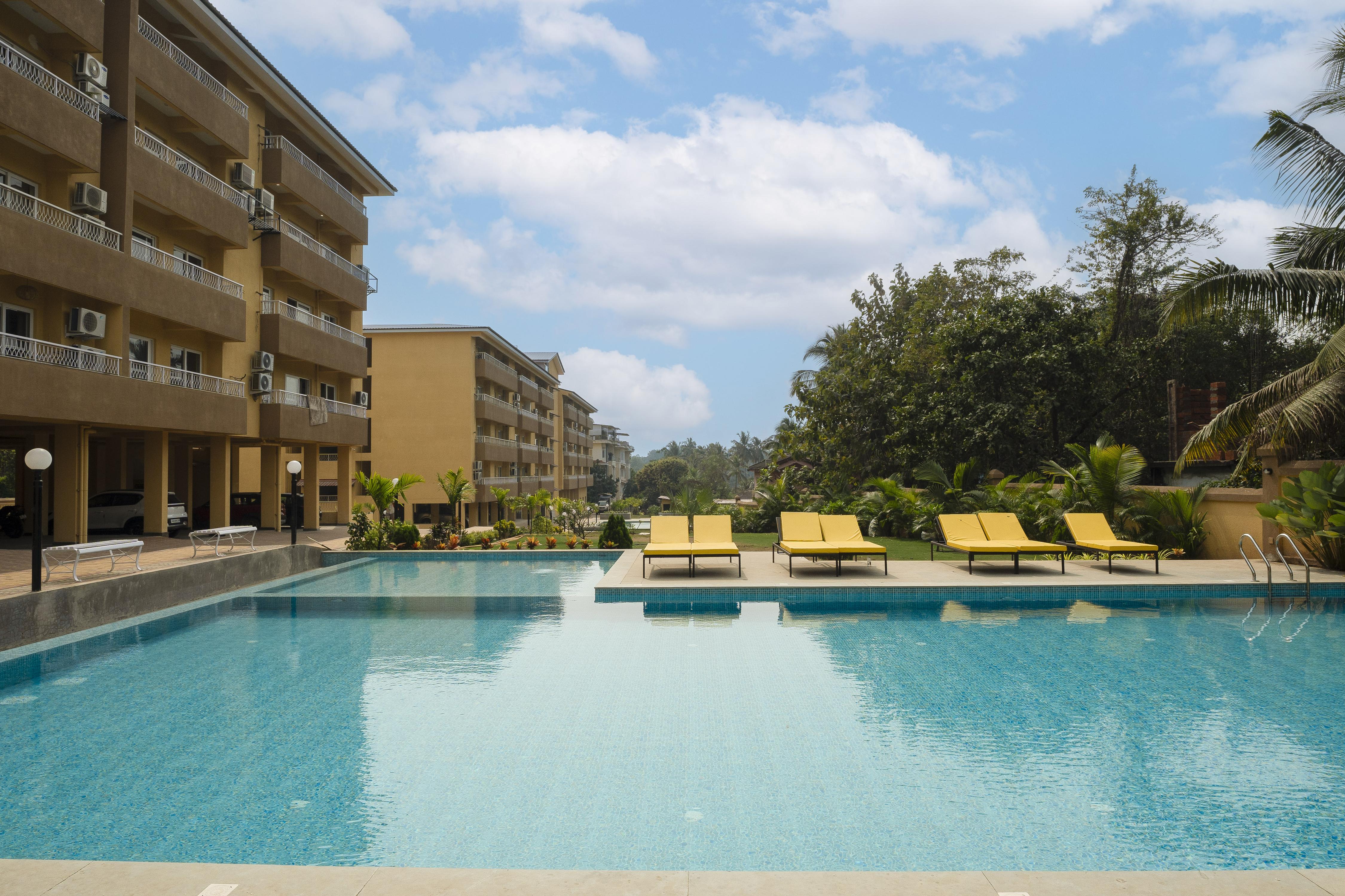 Spacious 2BR Apartment with Balcony near Candolim Beach | Hireavilla - Tap to explore photos