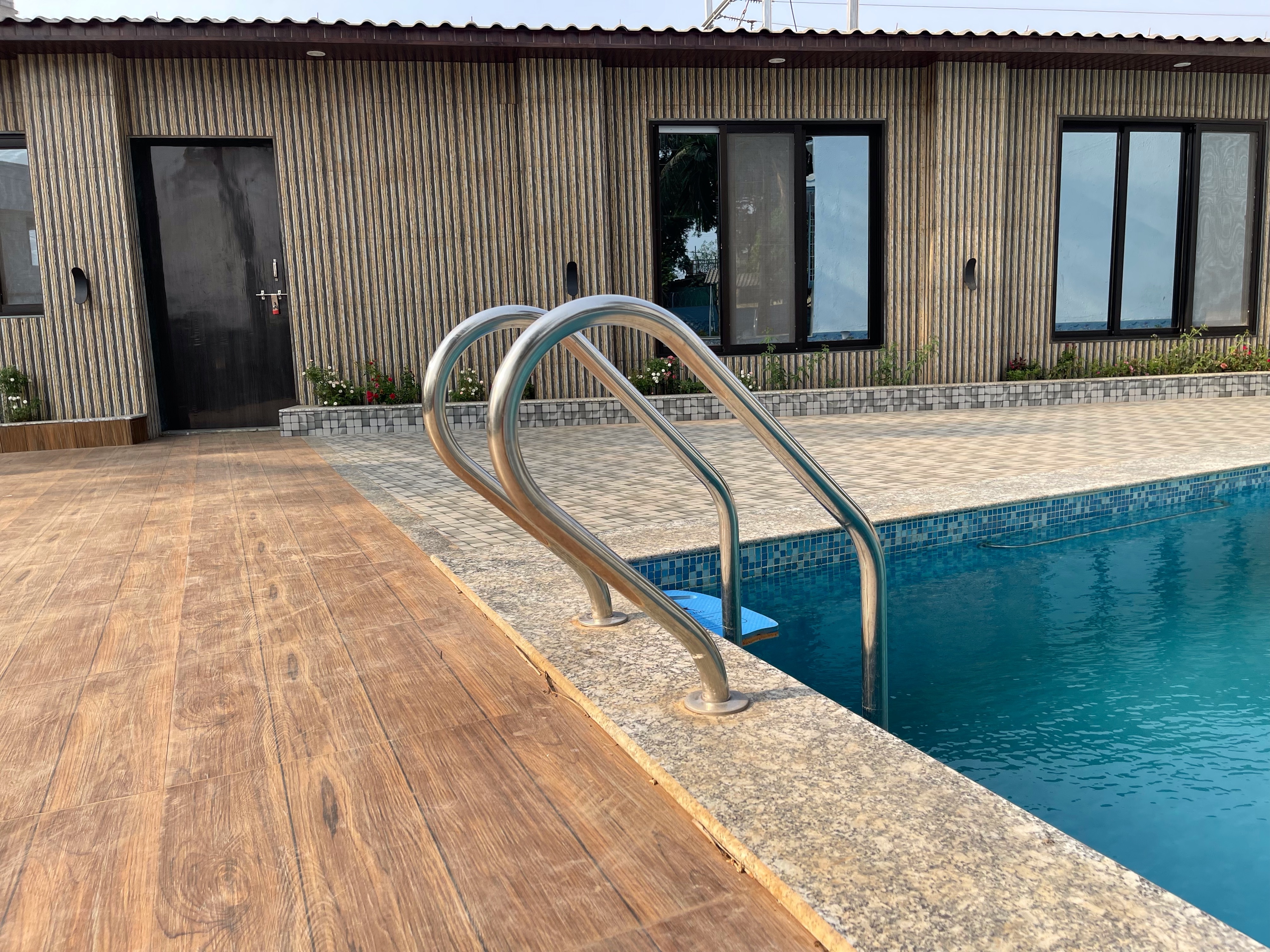 Capetown grey house karjat shelu - Tap to explore photos