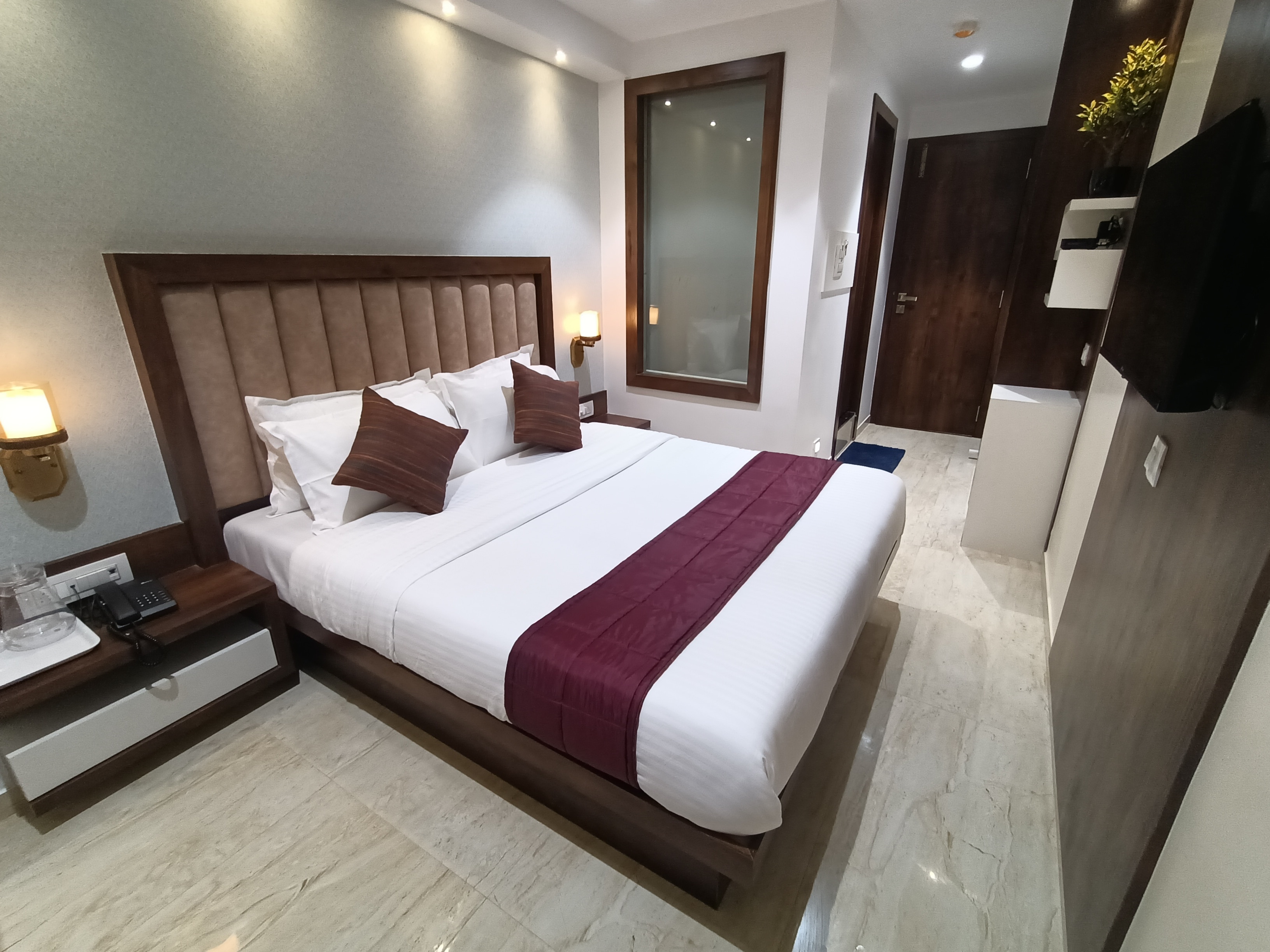 Hotel Saffron Inn Thane West - Tap to explore photos