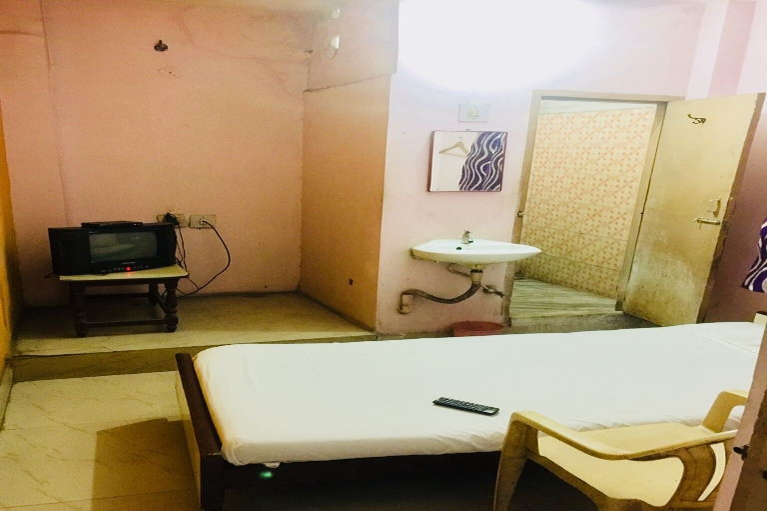 Hotel Adarsh - Tap to explore photos