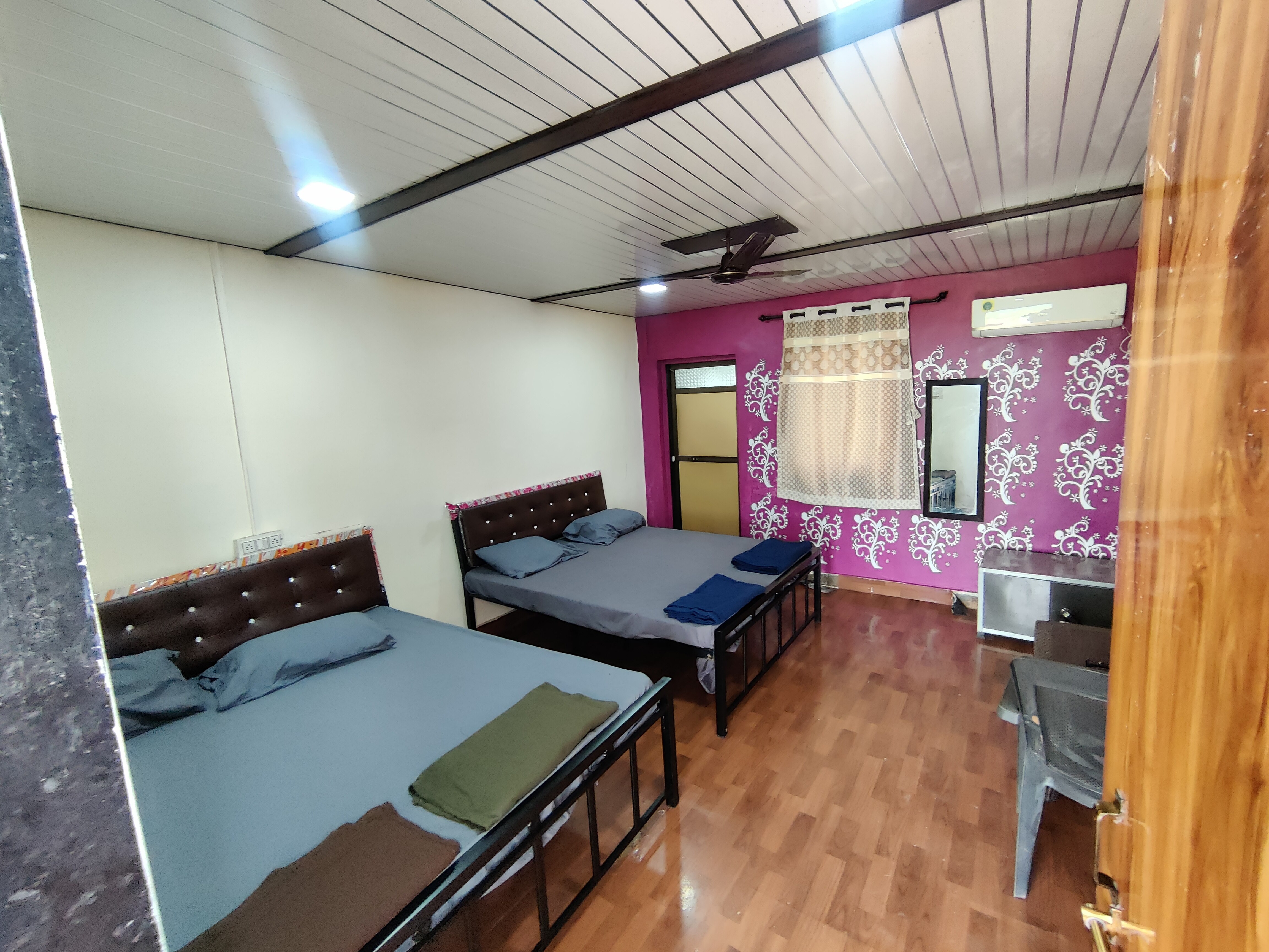 Savli Farm's AC Premium Rooms - Tap to explore photos