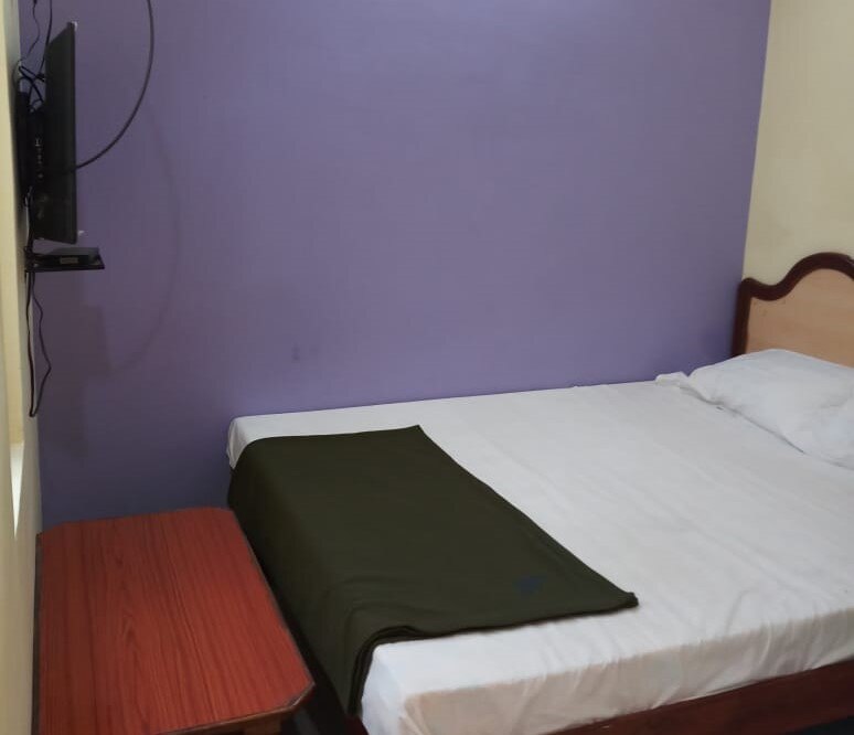 Sai Srinivasam AC Dormitory And AC Lodge - Tap to explore photos
