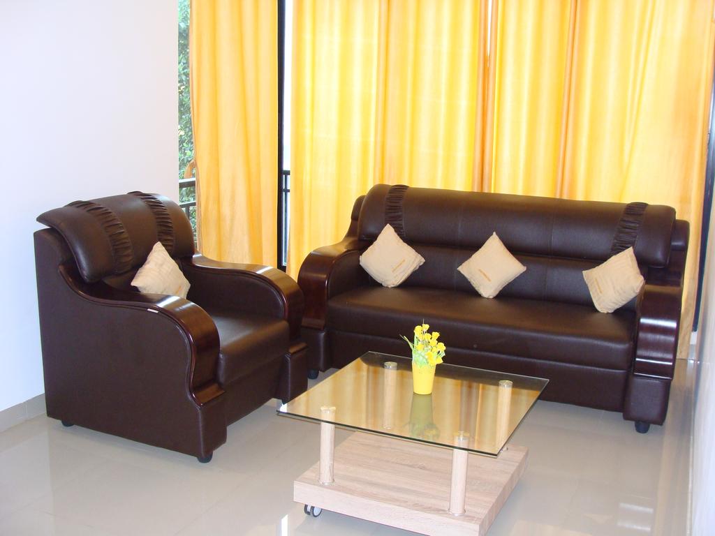 Charu Holiday Homes -1 BHK Apartment - Tap to explore photos