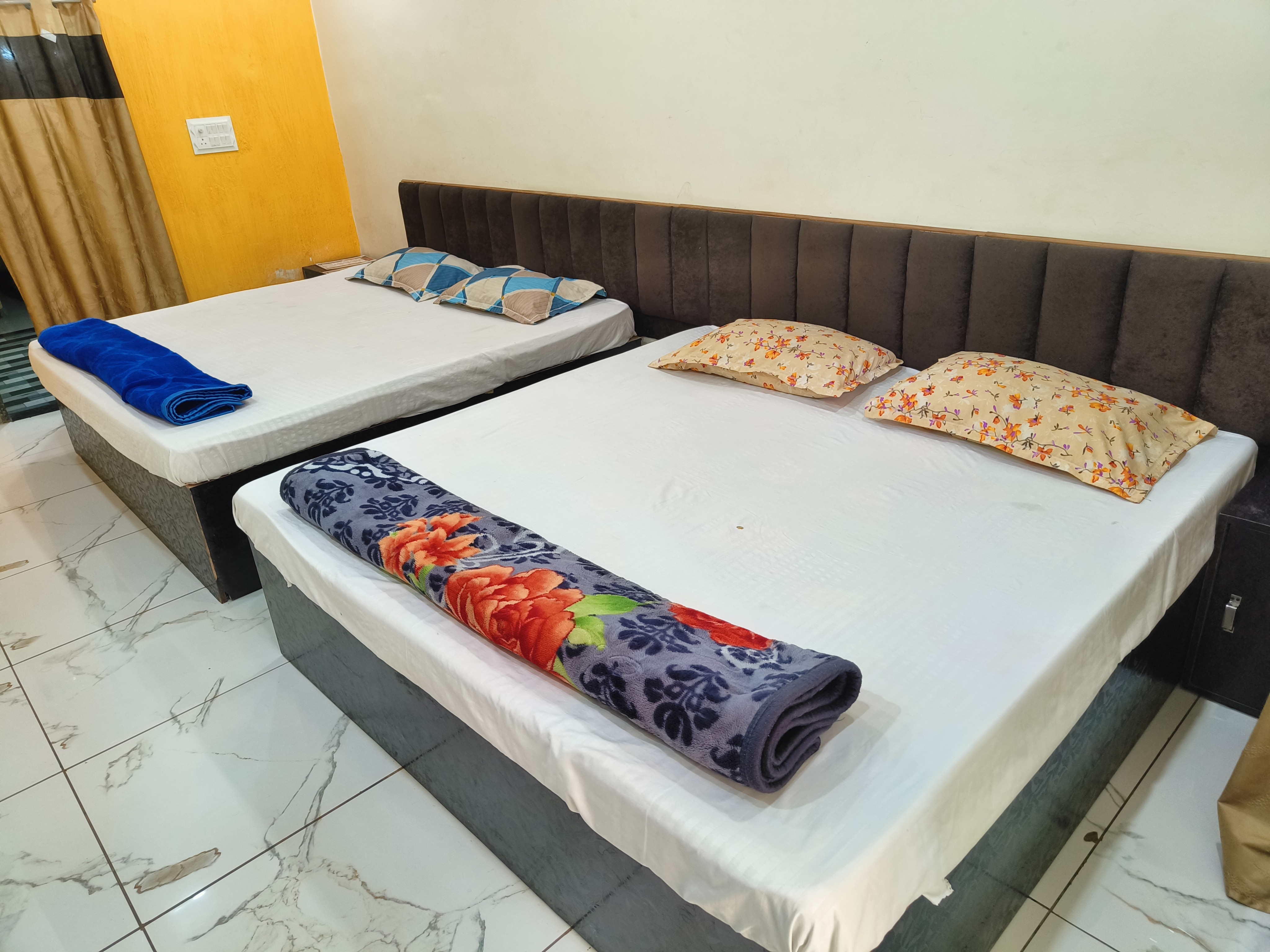 Kumkum guest House - Tap to explore photos