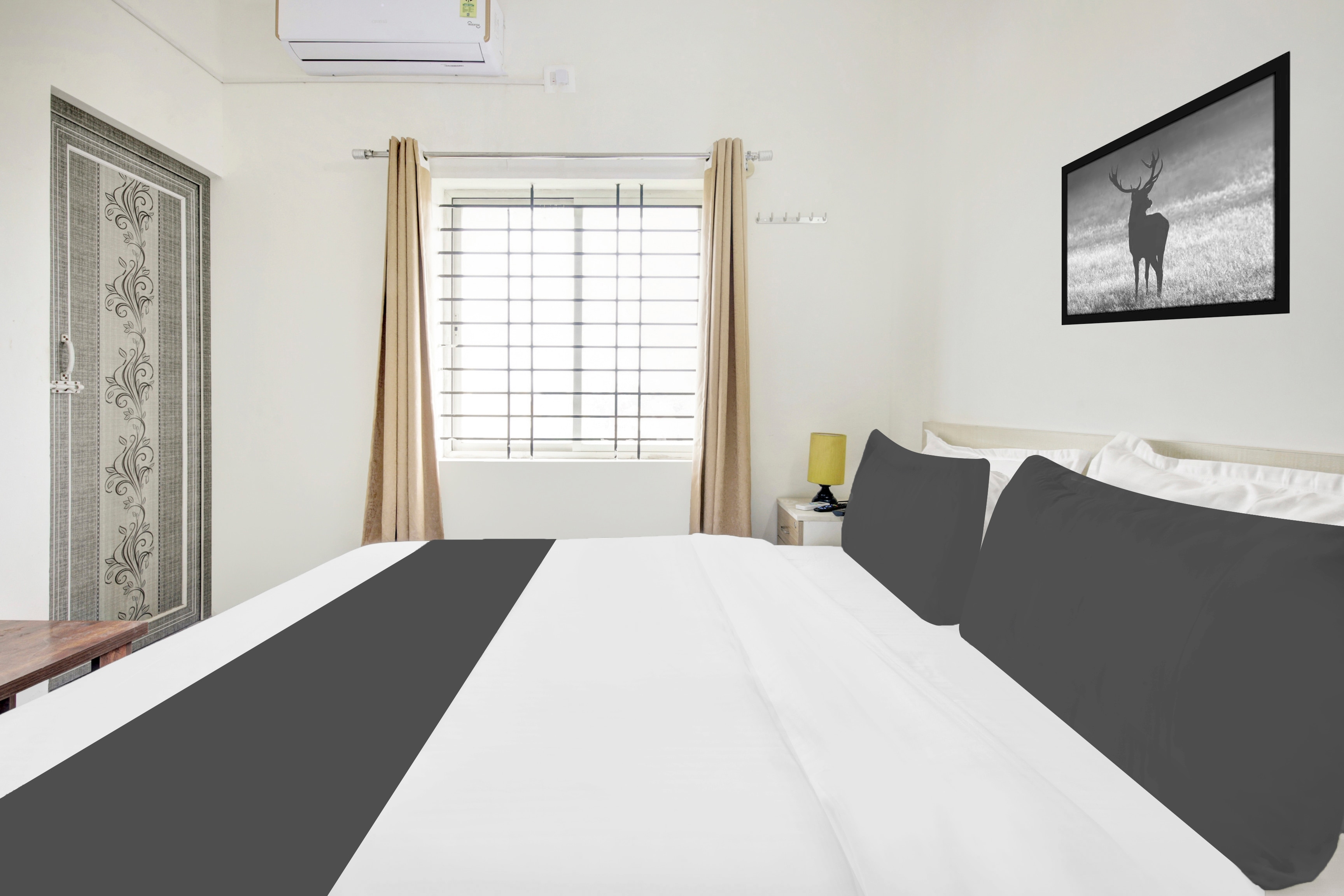 Hotel O Sri Manjunatha Deluxe Suites - Tap to explore photos