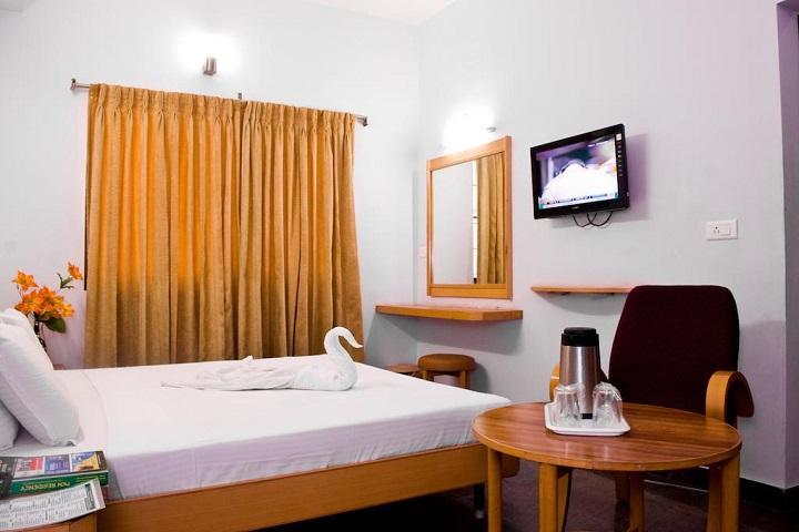 Hotel Rajadhane - Tap to explore photos
