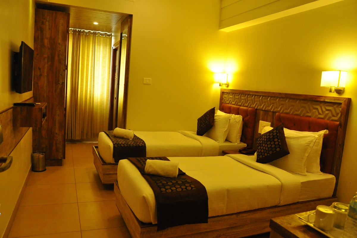 Hotel Thanmayi Inn - Tap to explore photos